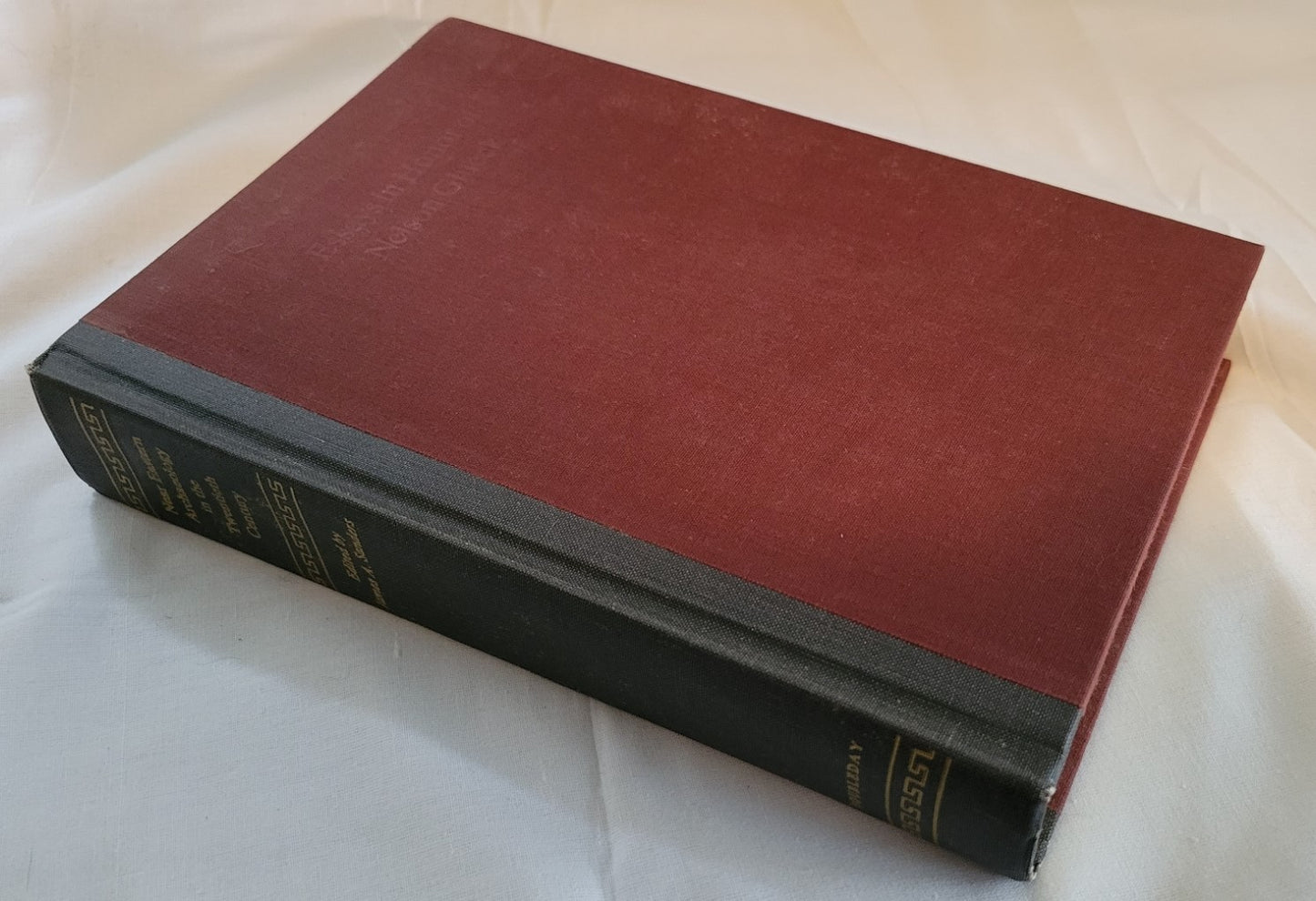 Used book for sale, “Near Eastern Archaeology in the Twentieth Century” edited by James A. Sanders, written in honor of Nelson Glueck. View of corner.