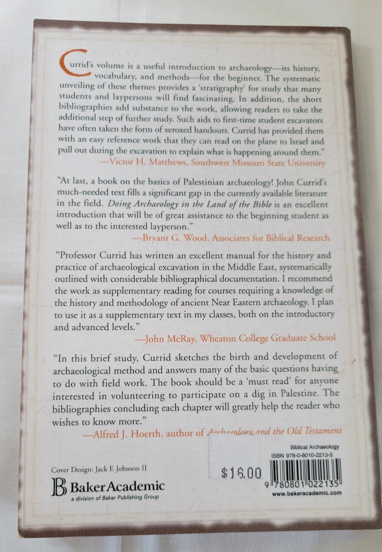 Used book “Doing Archaeology in the Land of the Bible: A Basic Guide” Written by John D. Currid. "A popular introduction to archaeology and the methods archaeologists use to reconstruct the history of ancient Israel." View of back cover.