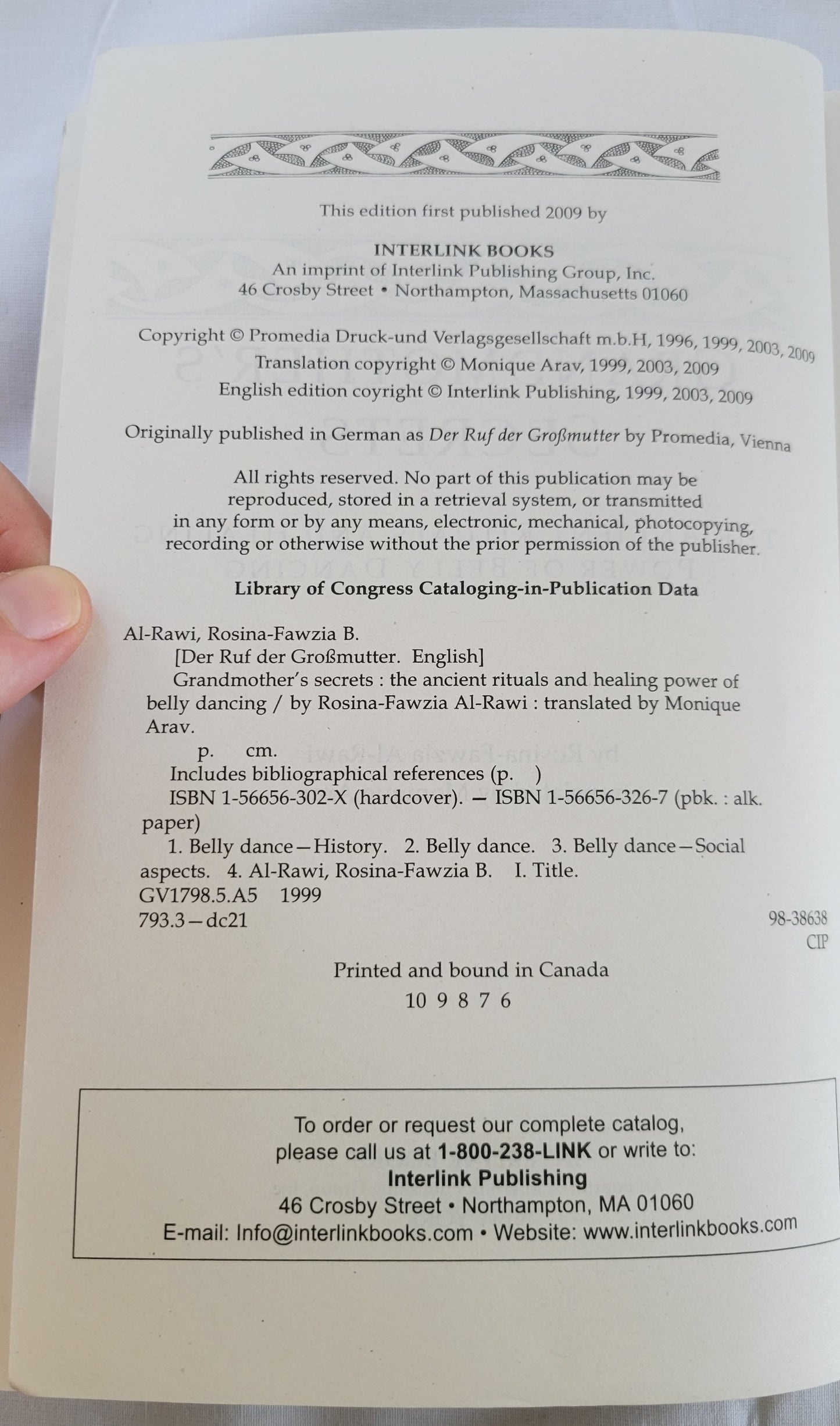 Used book for sale “Grandmother's Secrets: The Ancient Rituals and Healing Power of Belly Dancing” written by Rosina-Fawzia Al-Rawi, translated by Monique Arav. View of copyright info.