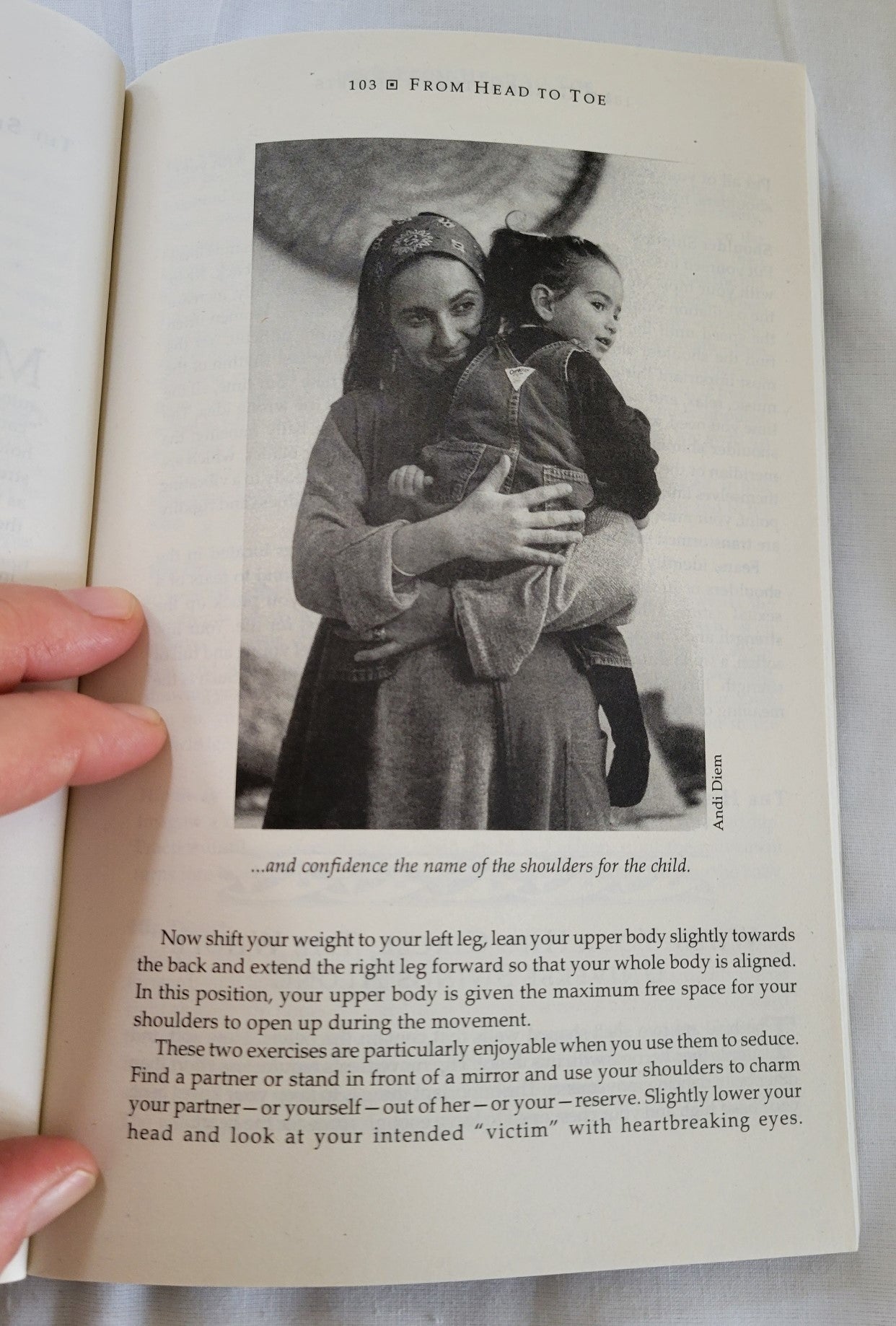 Used book for sale “Grandmother's Secrets: The Ancient Rituals and Healing Power of Belly Dancing” written by Rosina-Fawzia Al-Rawi, translated by Monique Arav. View of page 103 with photograph