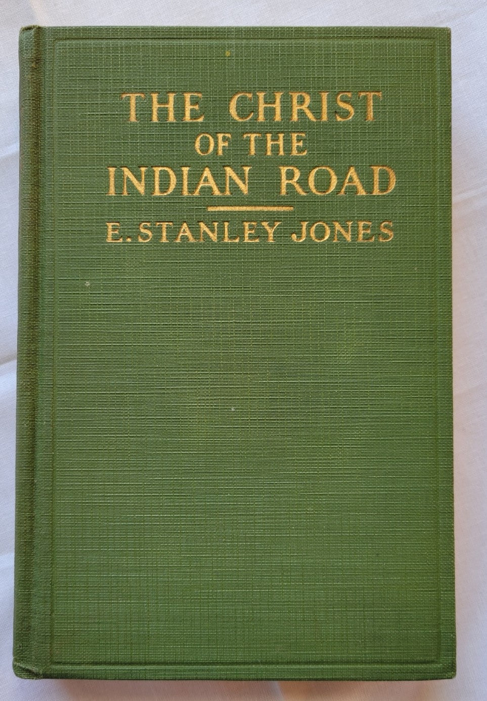 Antique book for sale "The Christ on Indian Road" by E. Stanley Jones, published by Abingdon Press, 1926. Front cover.