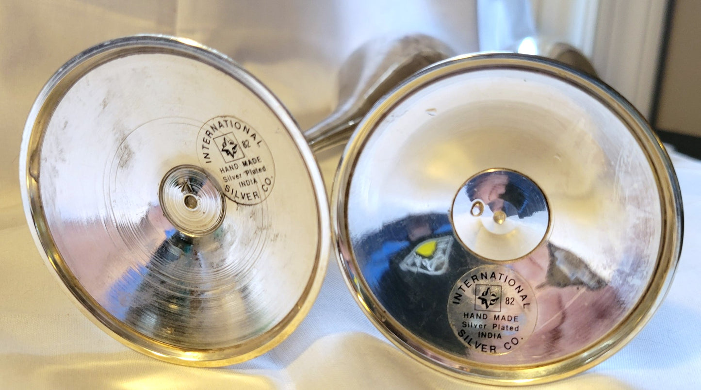 Vintage set of two International Silver Company silverplated glasses, handmade goblets from India, made in the 1980s. Bottom view.