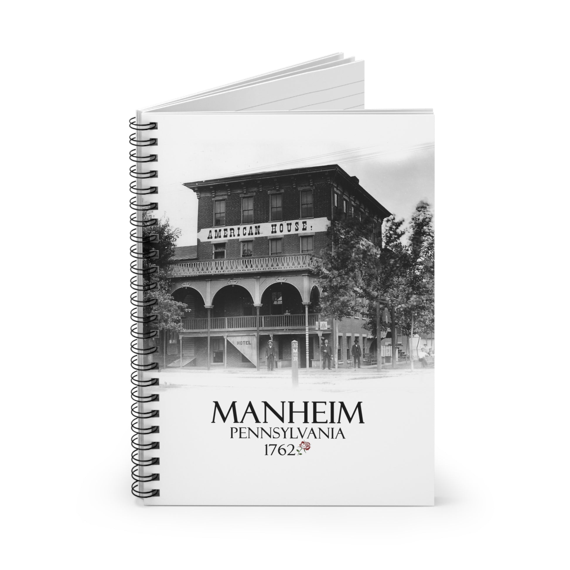 A notebook with an old historical photograph of the American House restaurant with the words "Manheim Pennsylvania 1762" at the bottom.