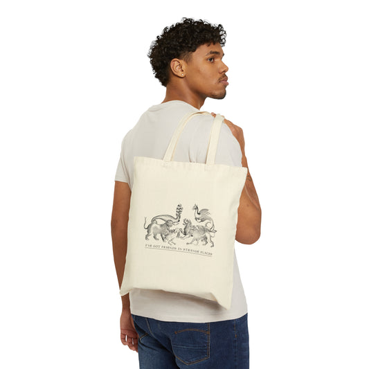 Canvas shopping tote with six 17th century engravings of bizarre and mythological creatures with the words "I've got friends in strange places" underneath.
