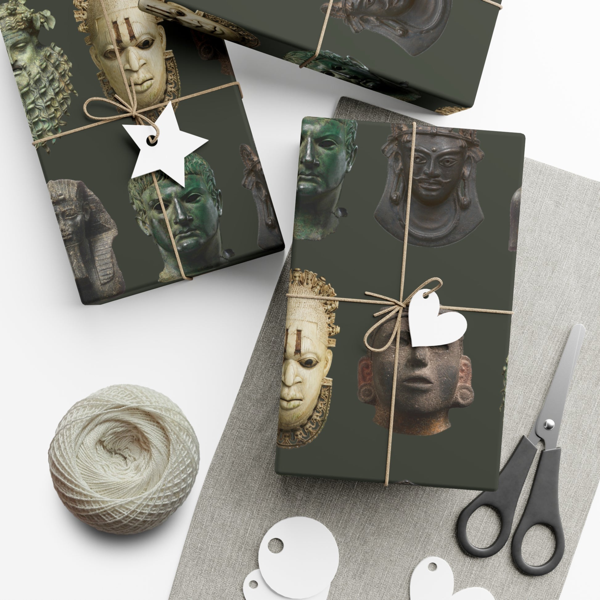 Eyes of the past silently peer out from this wonderfully unique wrapping paper, featuring ancient faces from across the world.