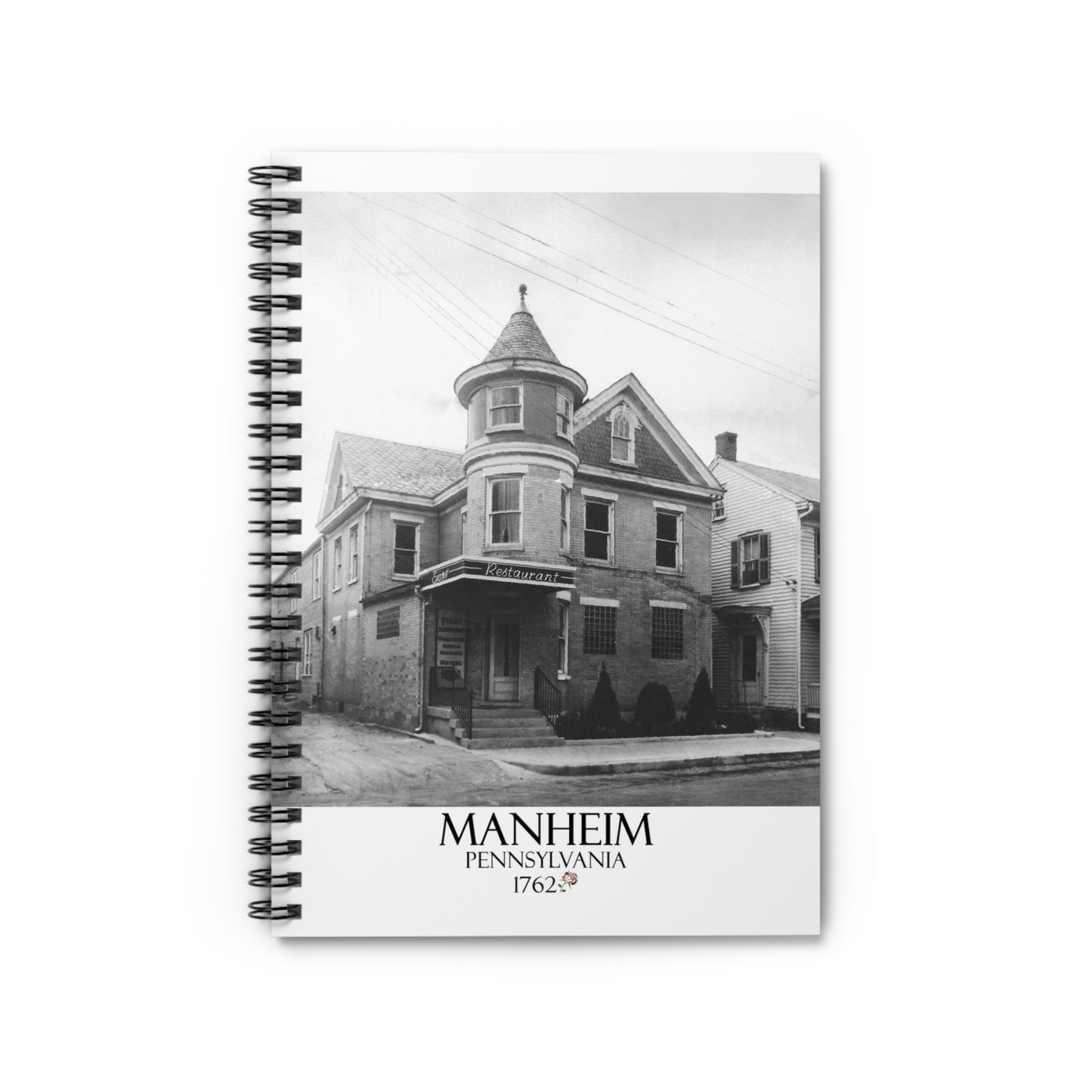 A notebook with an old historical photograph of a restaurant in Manheim Pennsylvania.
