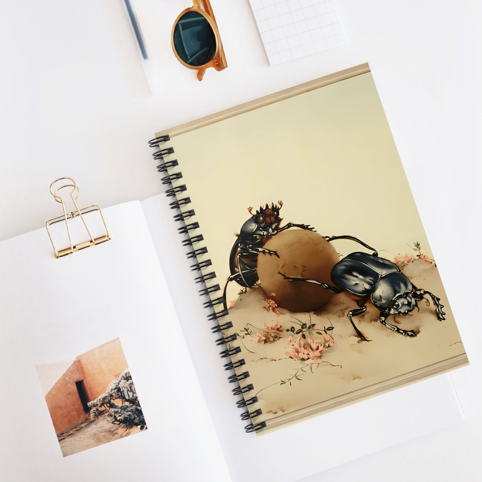 Spiral notebook with vintage illustration of two scarab dung beetles rolling a ball of poop, created by Jean-Henri Fabre.