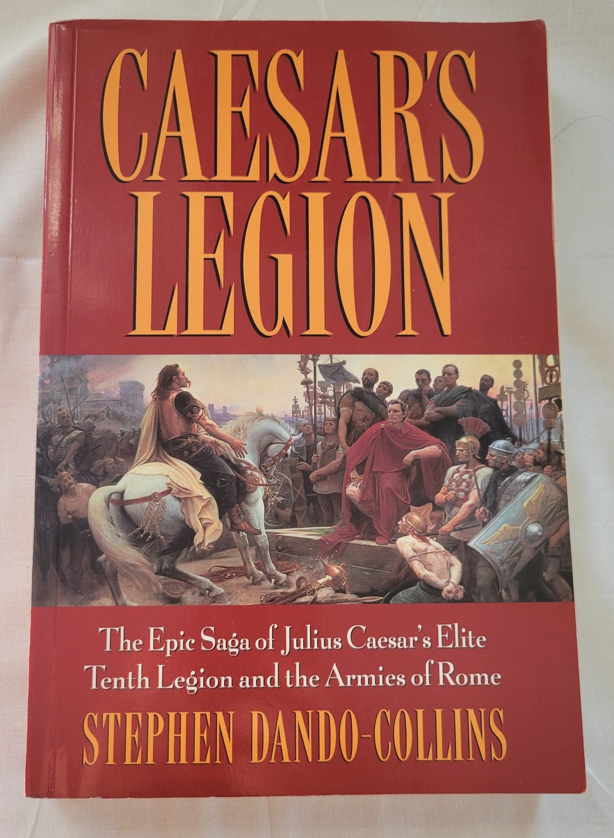 Caesar’s Legion: The Epic Saga of Julius Caesar’s Elite Tenth Legion and the Armies of Rome used book written by Stephen Dando-Collins, published by John Wiley & Sons, Inc.  View of front cover.