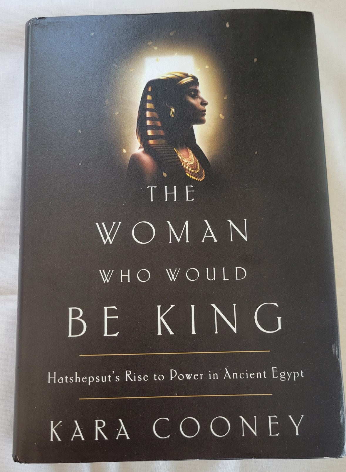 Used book for sale “The Woman Who Would Be King” written by Kara Cooney. Front cover.