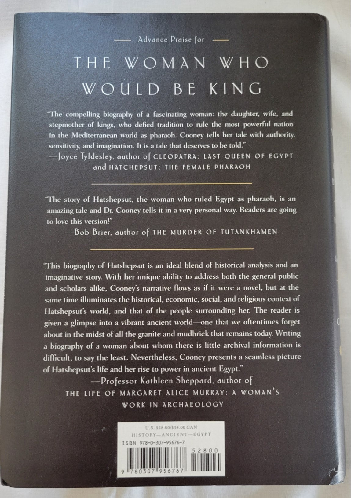 Used book for sale “The Woman Who Would Be King” written by Kara Cooney. Back cover.