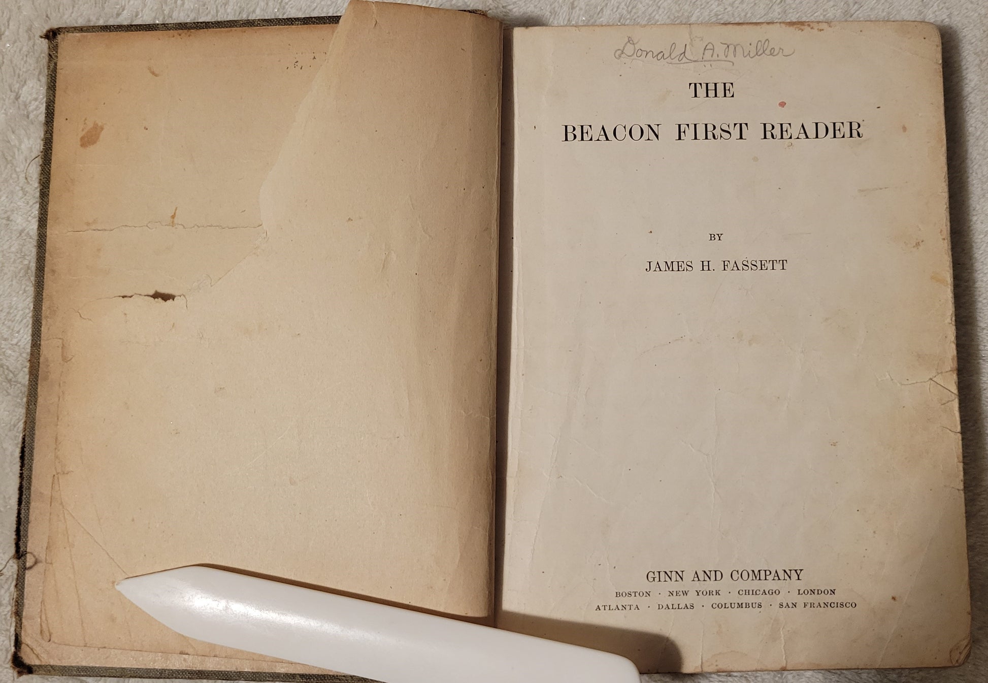 Antique book for sale "The Beacon First Reader" by James H. Fassett, Ginn and Company, 1913.  A child's schoolbook. Title page.