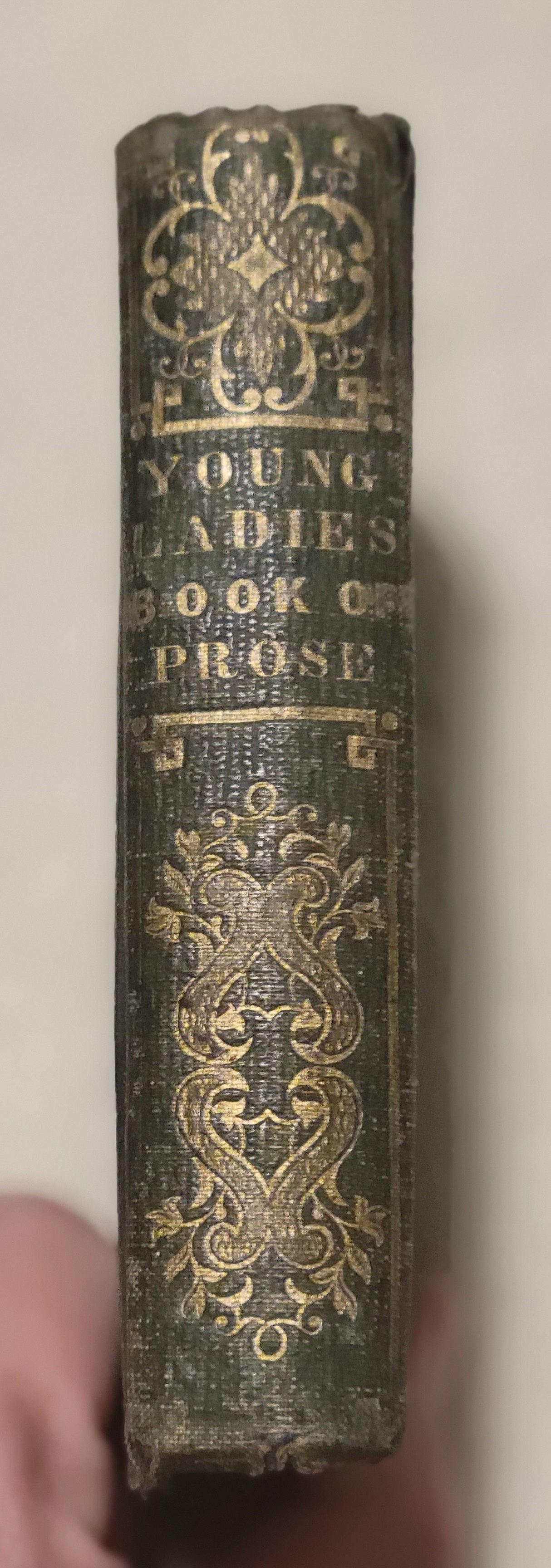 Antique book for sale “Young Lady's Book of Elegant Prose” by British and American authors, published by John Ball in Philadelphia in 1851. Spine.