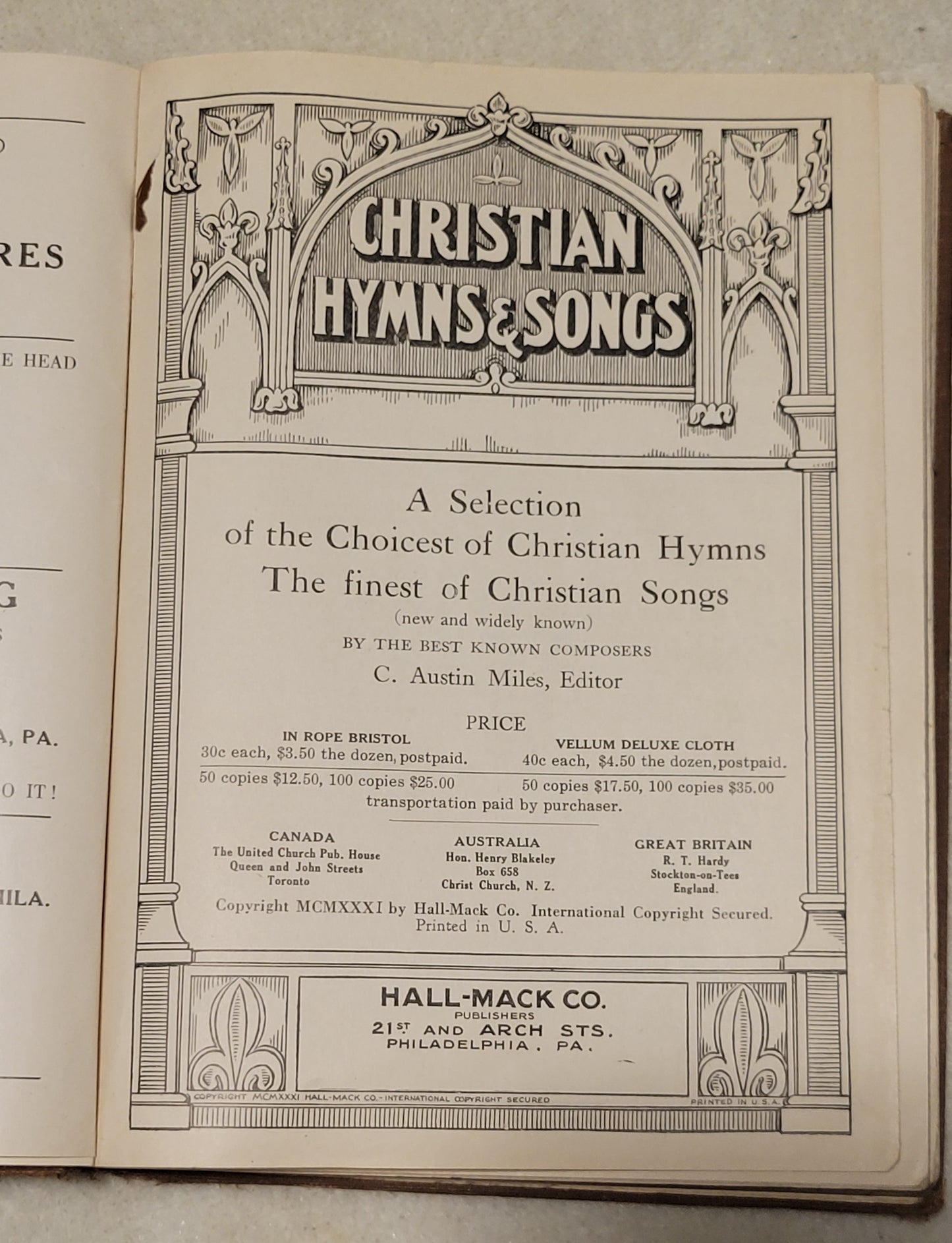 An antique book of Christian hymns and songs, published by Hall-Mack Co in Philadelphia in 1931.  View of inside title page.