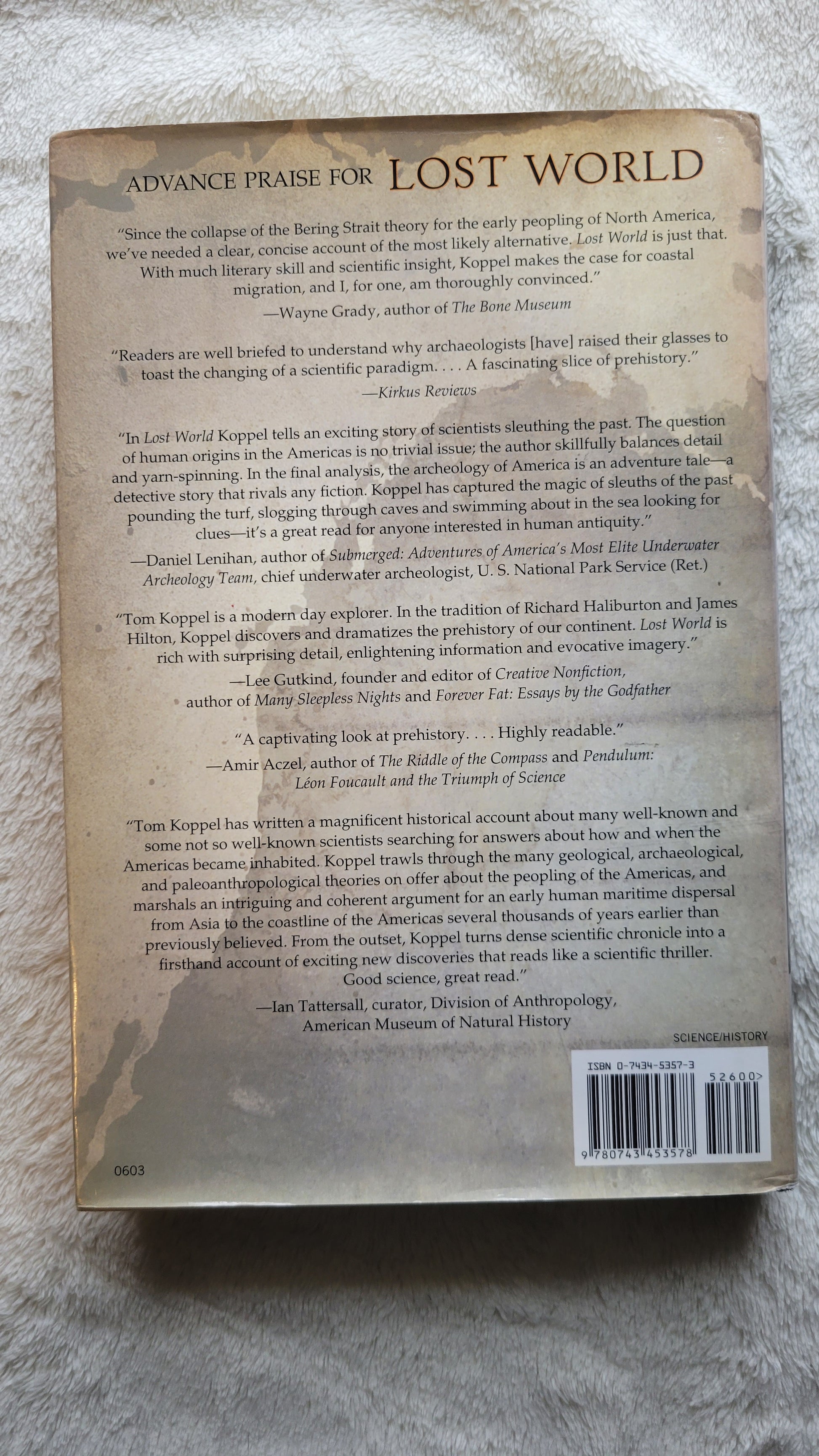 Used book for sale, "Lost World: Rewriting Prehistory – How New Science is Tracing America’s Ice Age Mariners" written by Tom Koppel, published by Atria Books, 2010. View of back cover.  