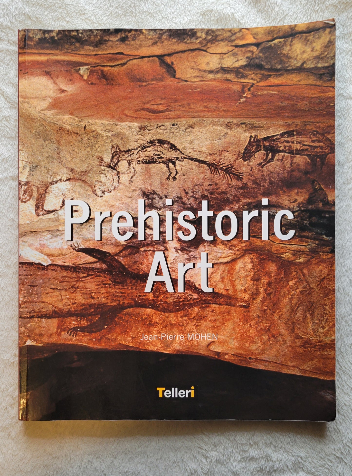 Used book for sale, "Prehistoric Art" was written by Dr. Jean-Pierre Mohen, published by Finest S.A. / Editions. View of front cover.