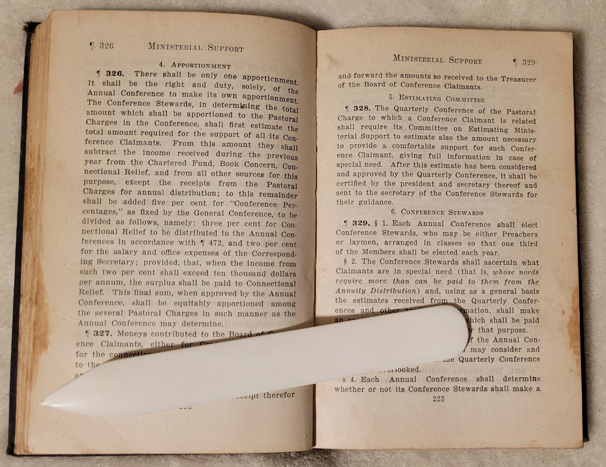 Antique book "Doctrines and Discipline of the Methodist Episcopal Church" published by the Methodist Book Concern, 1912. View of pages 222 and 223.