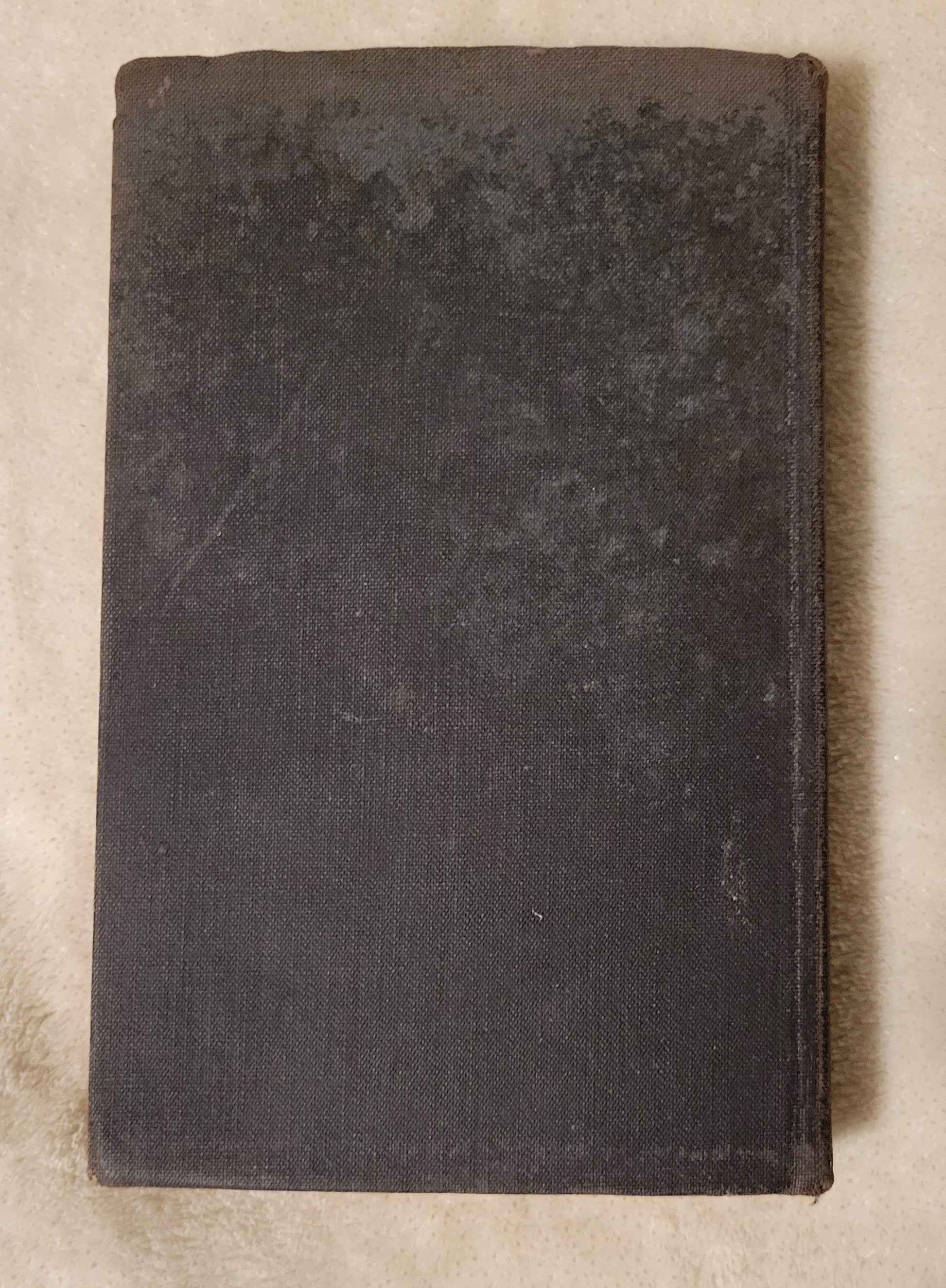 Antique book "Doctrines and Discipline of the Methodist Episcopal Church" published by the Methodist Book Concern, 1912. View of back cover.
