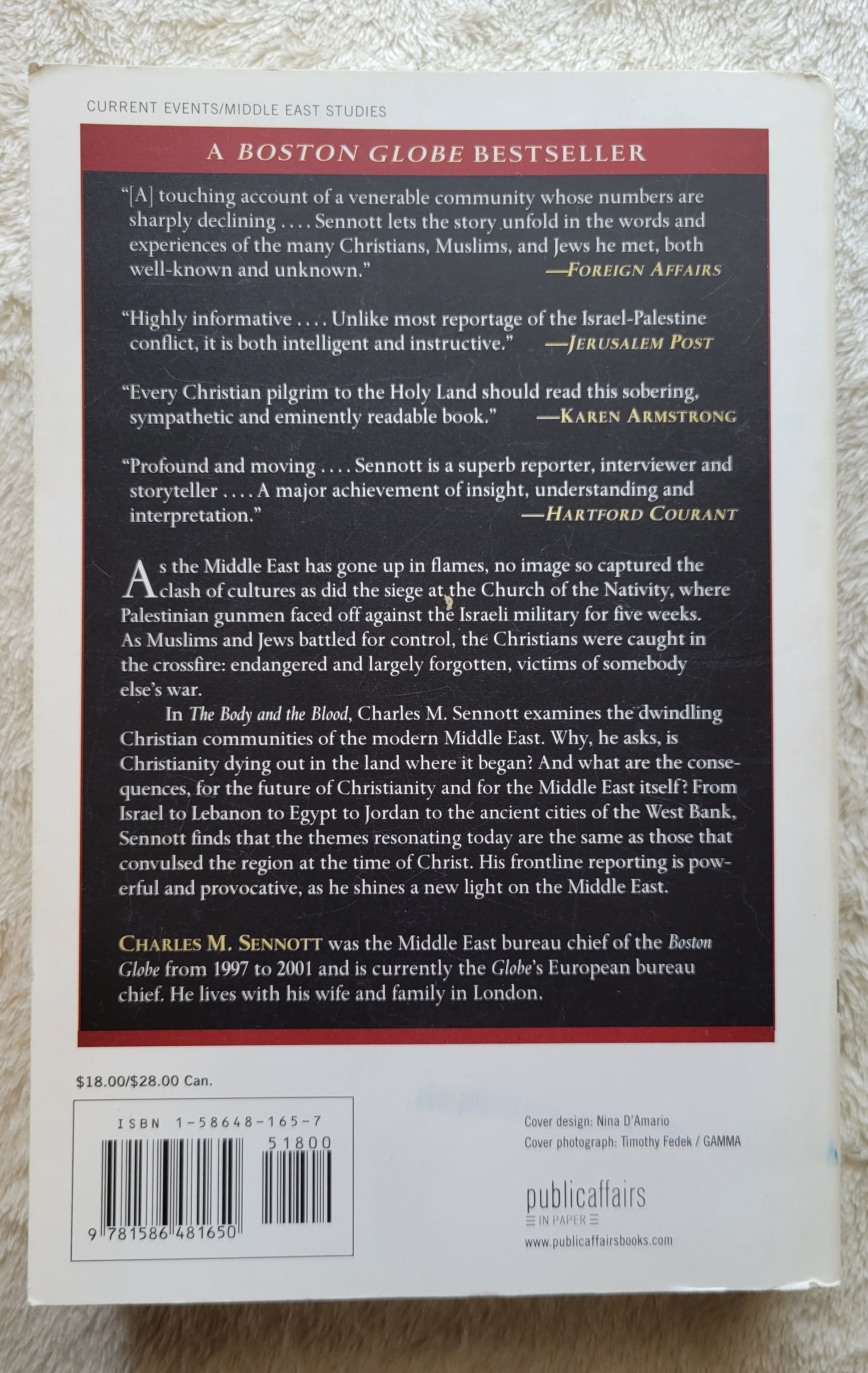 Used book for sale "The Body and the Blood: The Middle East's Vanishing Christians and the Possibility for Peace" by Charles M. Sennott, published in 2003 by PublicAffairs, a member of the Perseus Books Group. Back cover.