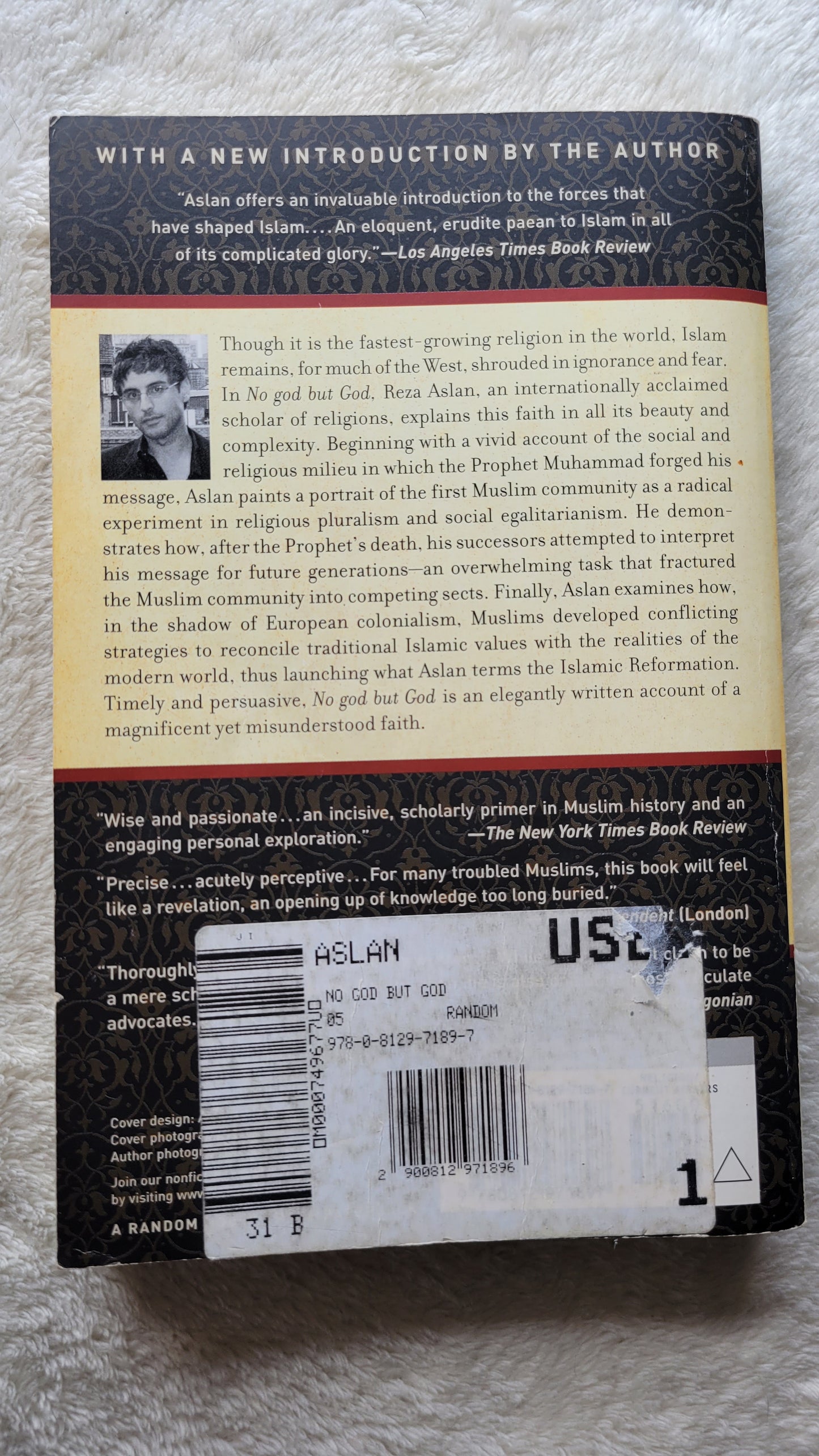 Used book for sale, "No god but God: The Origins, Evolution, and Future of Islam" by Reza Aslan, Random House publishers, 2006. View of back cover.
