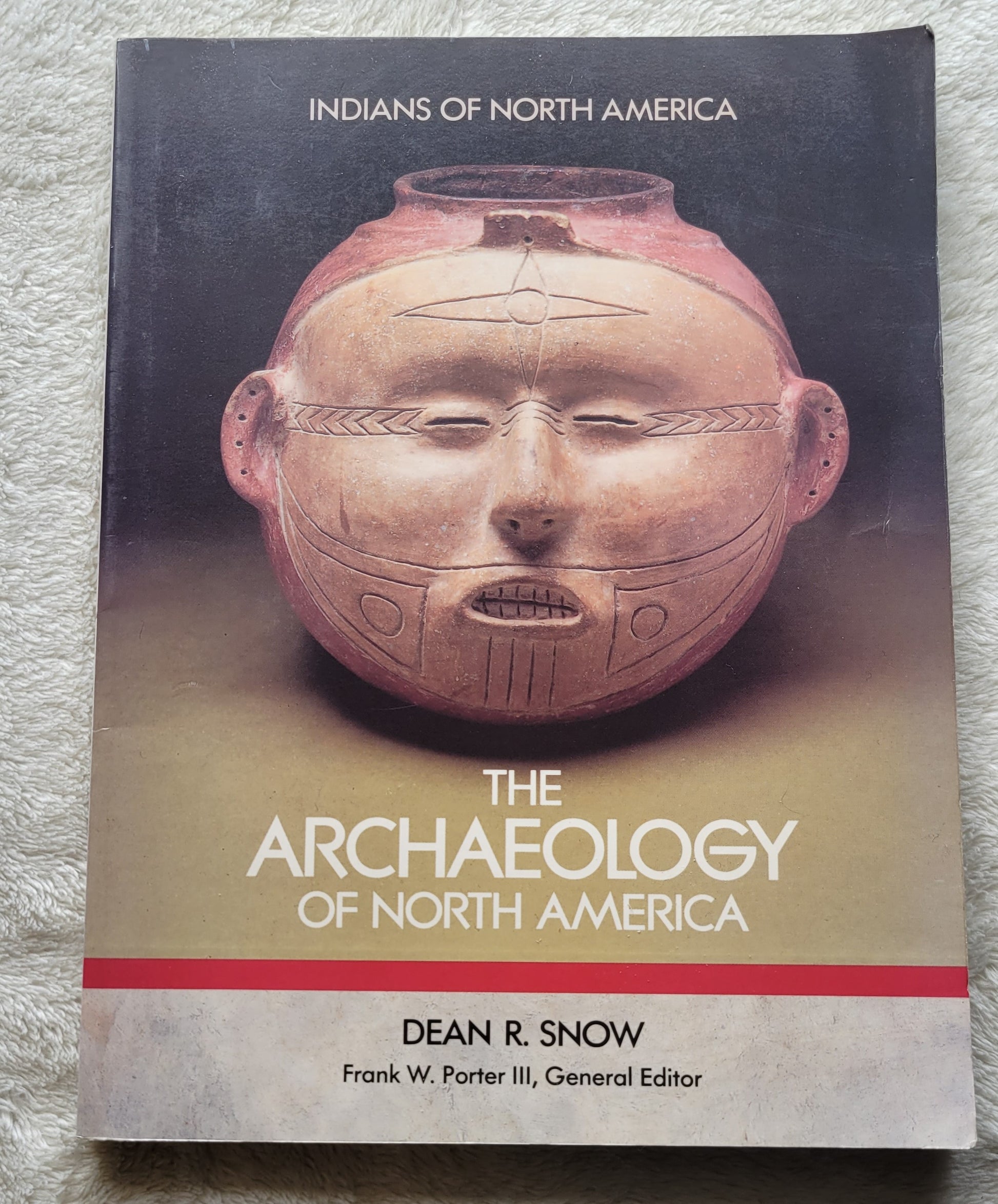 "Archaeology of North America" by Dean R. Snow, Chelsea House publishers, 1989. "Archaeology of North America tells the fascinating story of how archaeologists investigate the origins and prehistory of American Indians.  View of front.