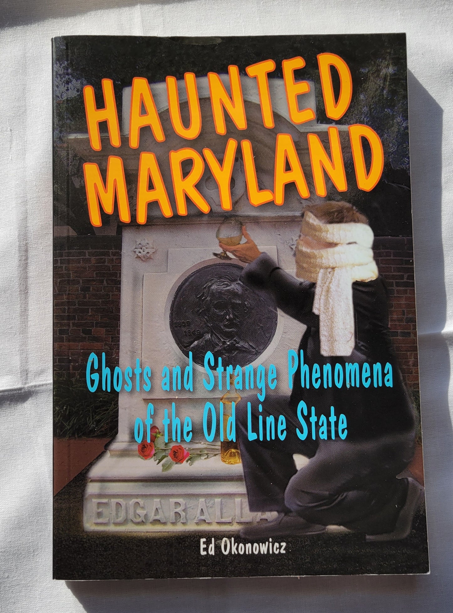 Used book for sale, "Haunted Maryland: Ghosts and Strange Phenomena of the Old Line State" by Ed Okonowicz, published by Stackpole Books. View of front cover.
