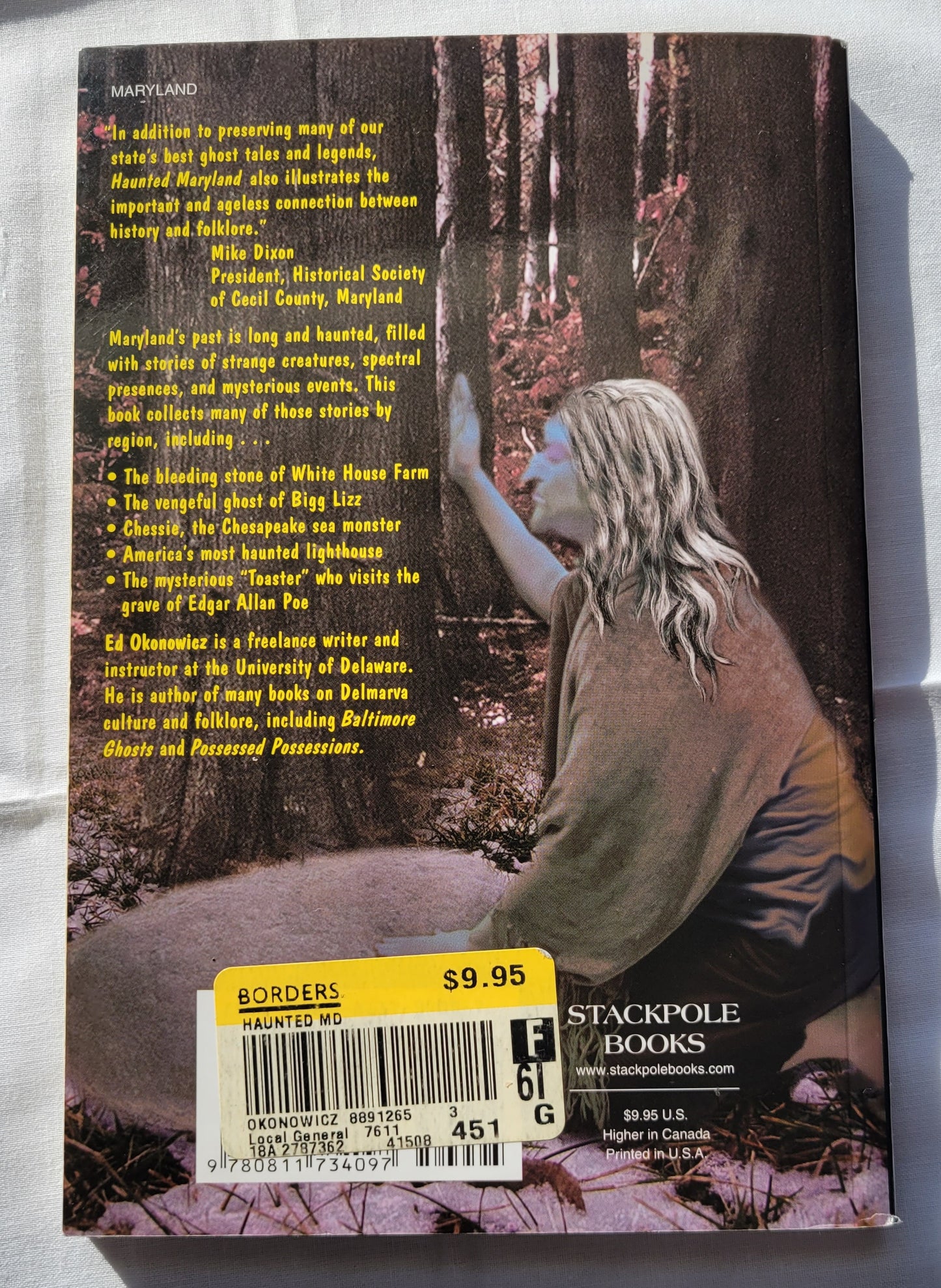 Used book for sale, "Haunted Maryland: Ghosts and Strange Phenomena of the Old Line State" by Ed Okonowicz, published by Stackpole Books. View of back cover.
