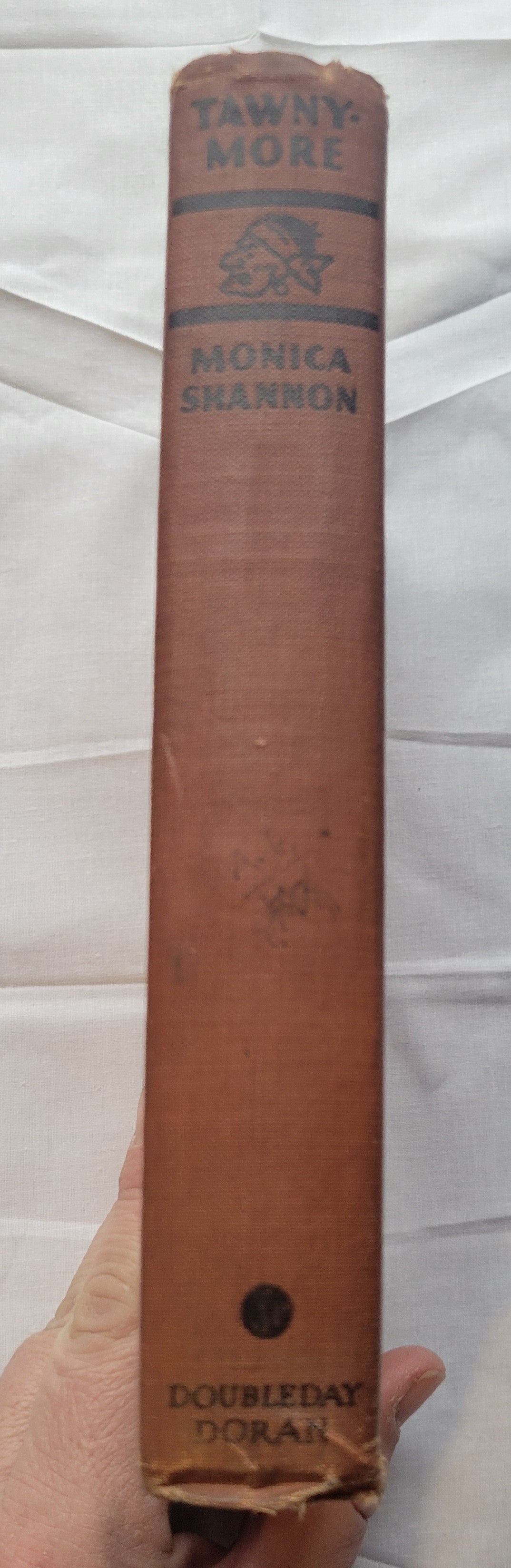 Vintage book for sale “Tawnymore” by Monica Shannon, illustrated by Jean Charlot, published by Doubleday, Doran, & Company in 1931. Spine.
