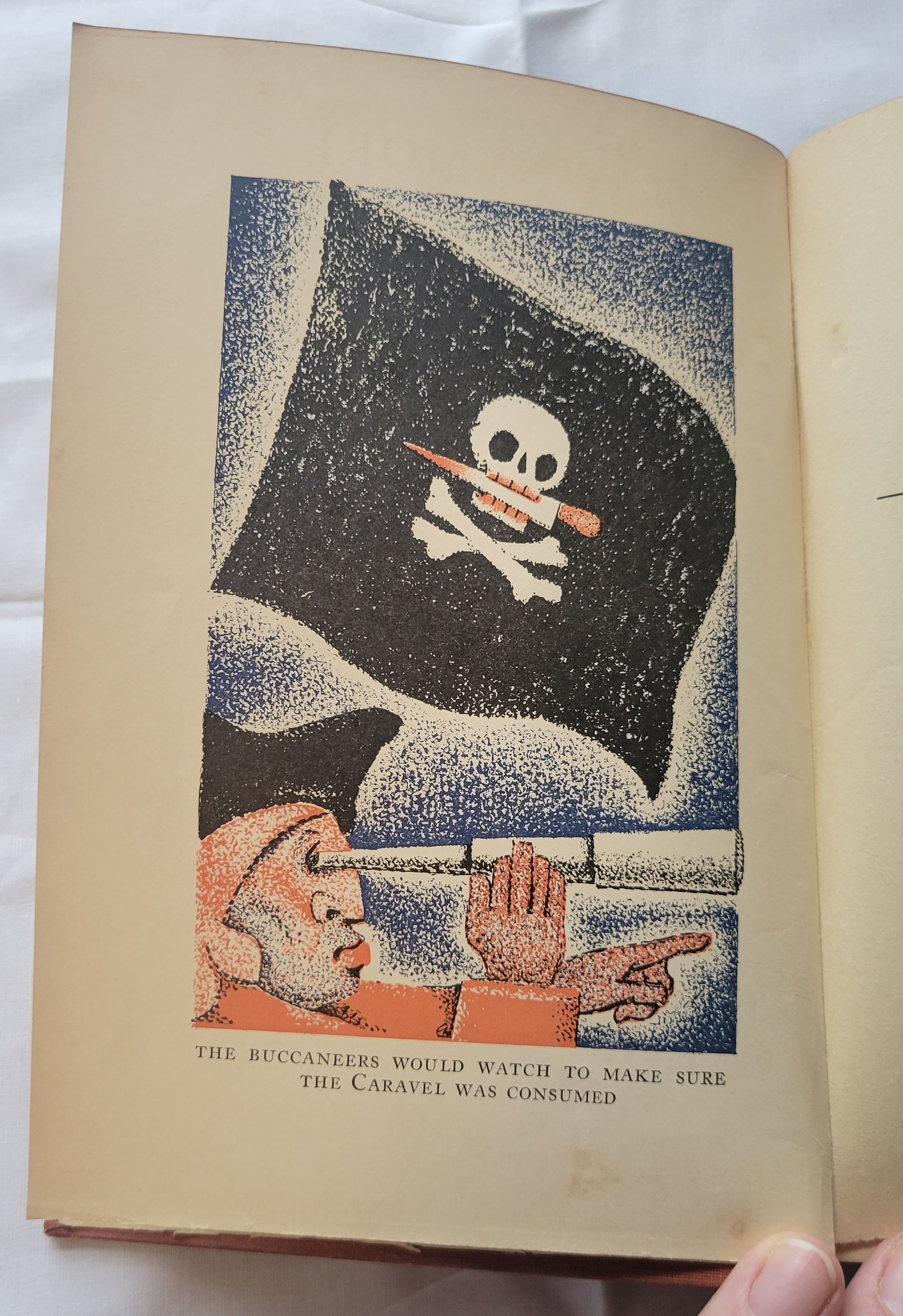 Vintage book for sale “Tawnymore” by Monica Shannon, illustrated by Jean Charlot, published by Doubleday, Doran, & Company in 1931. Illustration of buccaneer and pirate flag.