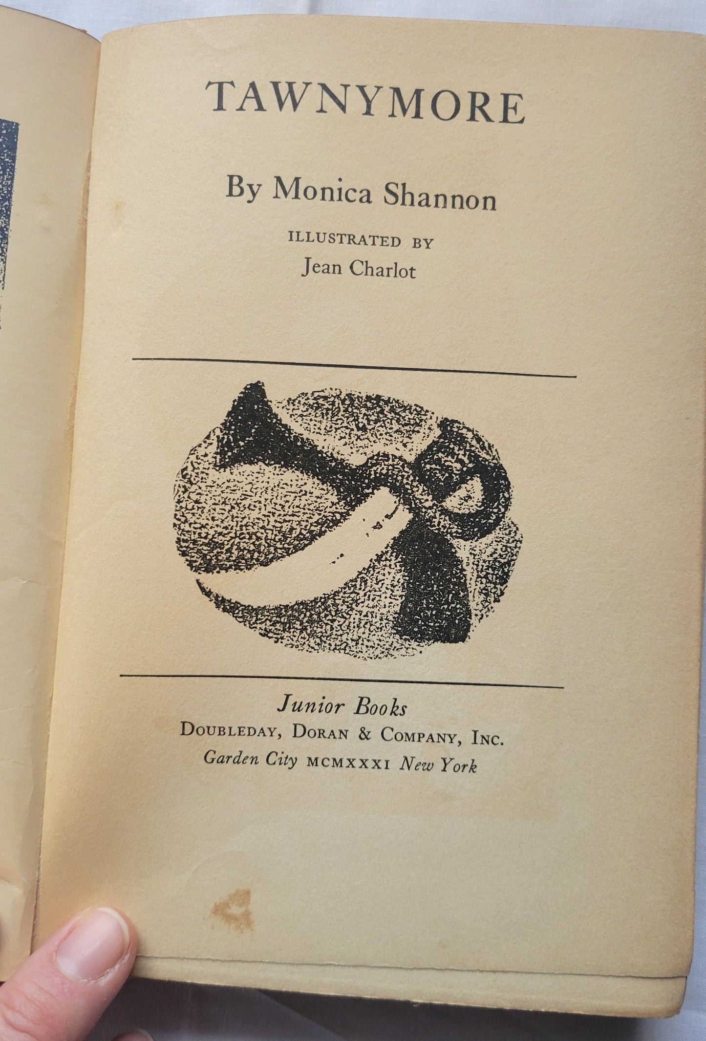 Vintage book for sale “Tawnymore” by Monica Shannon, illustrated by Jean Charlot, published by Doubleday, Doran, & Company in 1931.  Title page.