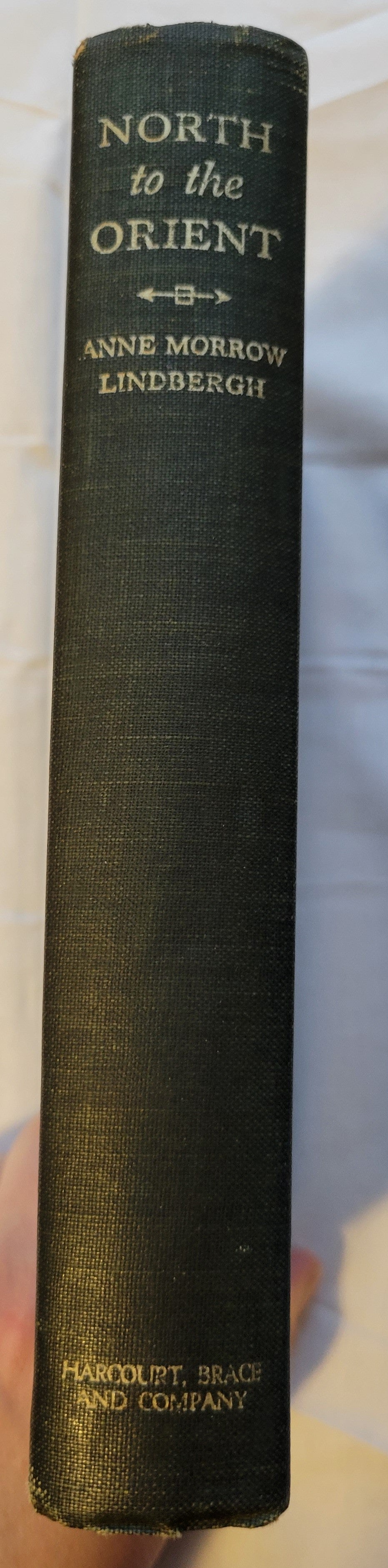 Vitnage book for sale, "North to the Orient" by Anne Morrow Lindbergh, with maps by Charles A. Lindbergh, published by Quinn & Boden Company, Inc. in 1935. View of spine
