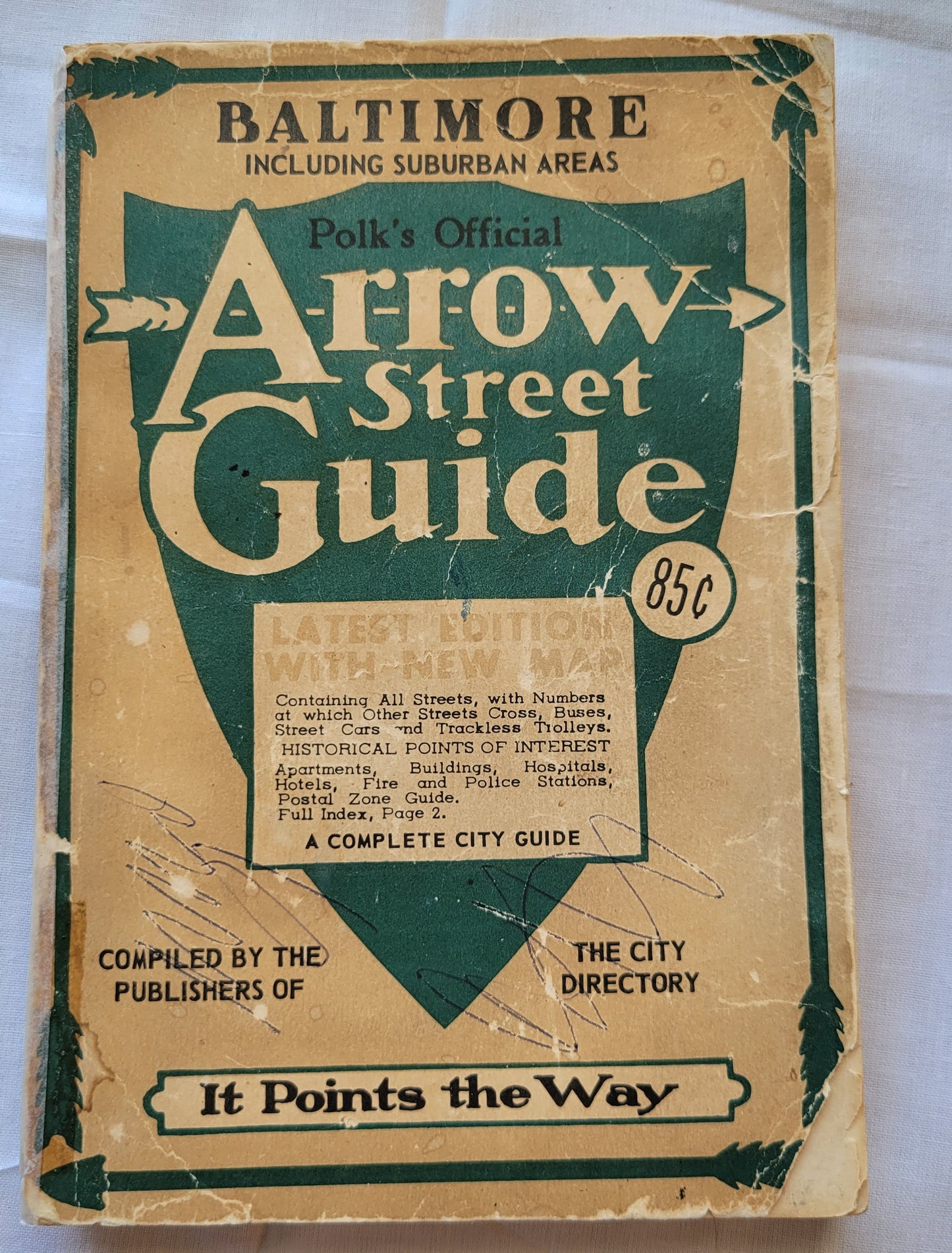 Polk's Official "Arrow Street Guide" is "a complete city guide" to Baltimore, as it was in 1959.  Front cover.