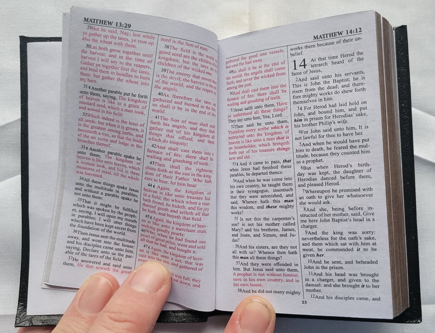 Used book for sale, Pocket size, red letter, King James Version New Testament. View of interior page.