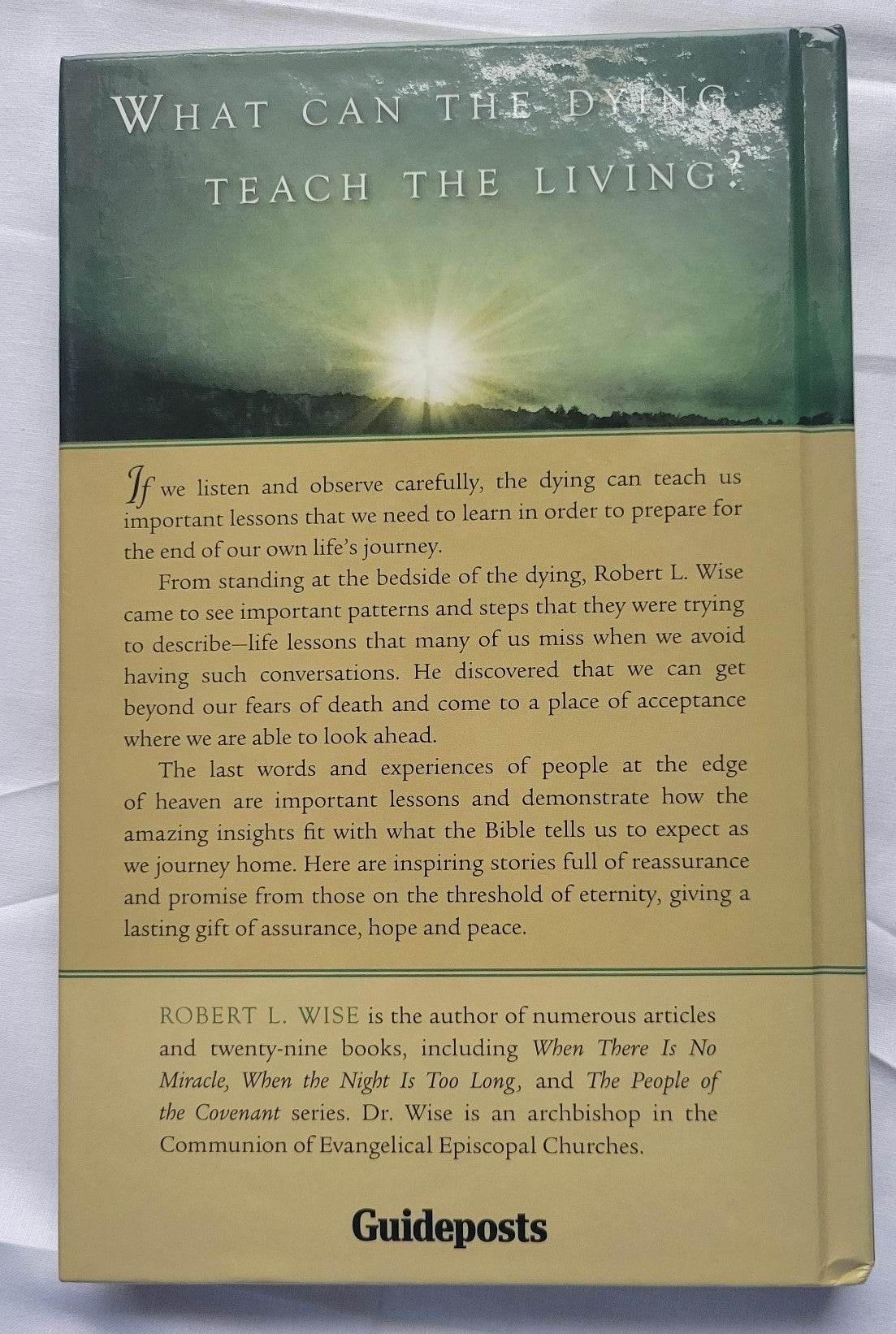 Used book "Crossing the Threshold of Eternity: What the Dying Can Teach the Living" by Dr. Robert L. Wise, published by Gospel Light, 2007. View of back cover.