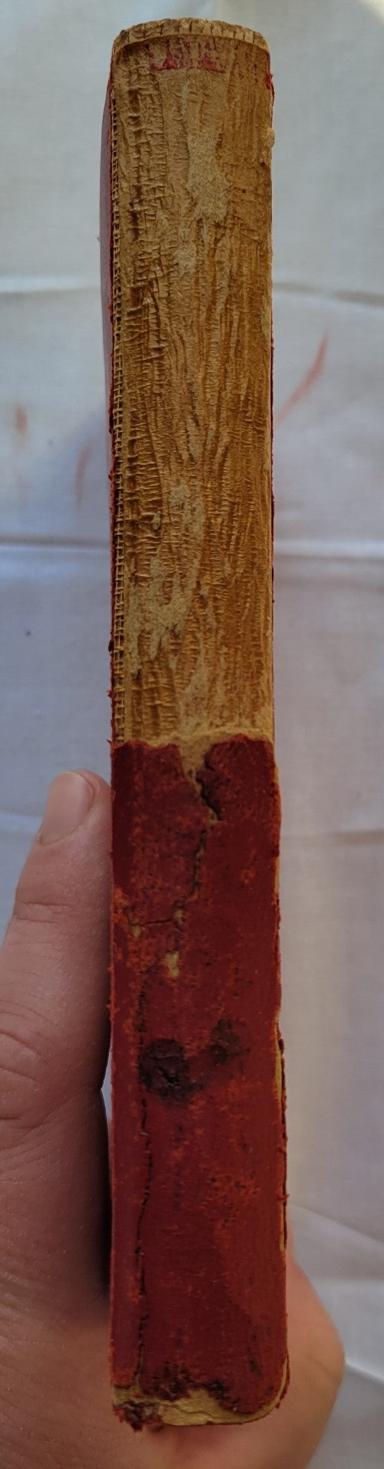 Antique book for sale, Homer's ancient Greek epic, The Odyssey translated by Alexander Pope, published by A. L. Burt Company (before 1932), with notes from Rev. Theodore Alois Buckley M.A. View of spine.