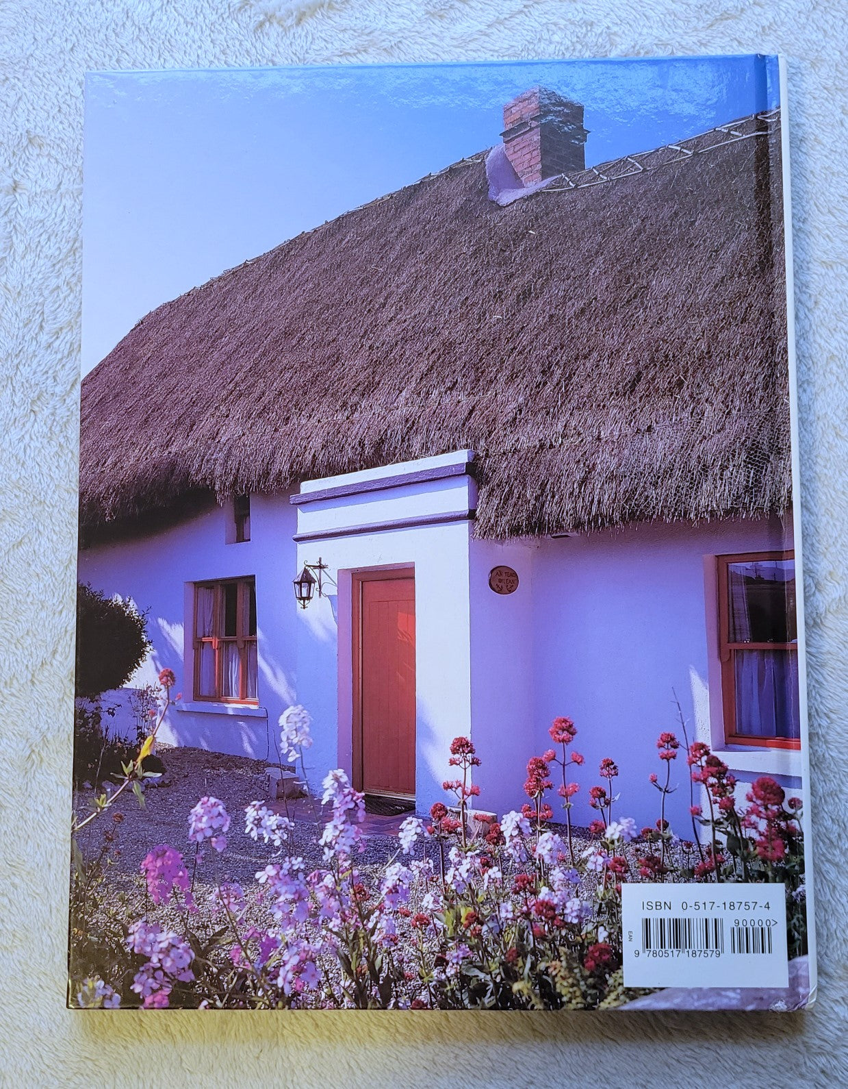 Used book for sale, travel photography, “Ireland: A Photographic Tour” by Carol W. Highsmith and Ted Landphair, published by Random House, 1998. View of back cover.