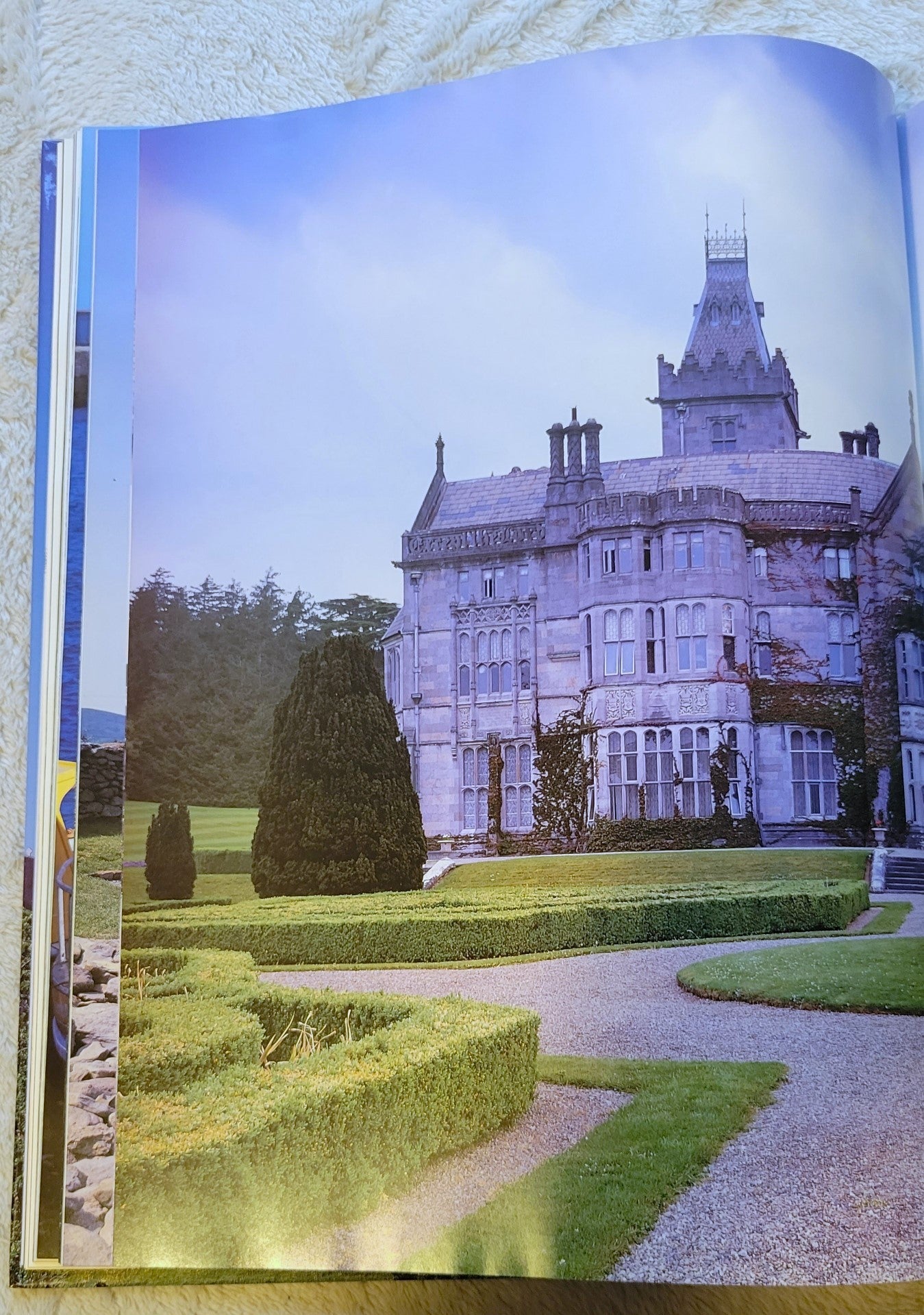 Used book for sale, travel photography, “Ireland: A Photographic Tour” by Carol W. Highsmith and Ted Landphair, published by Random House, 1998. View of castle photograph.
