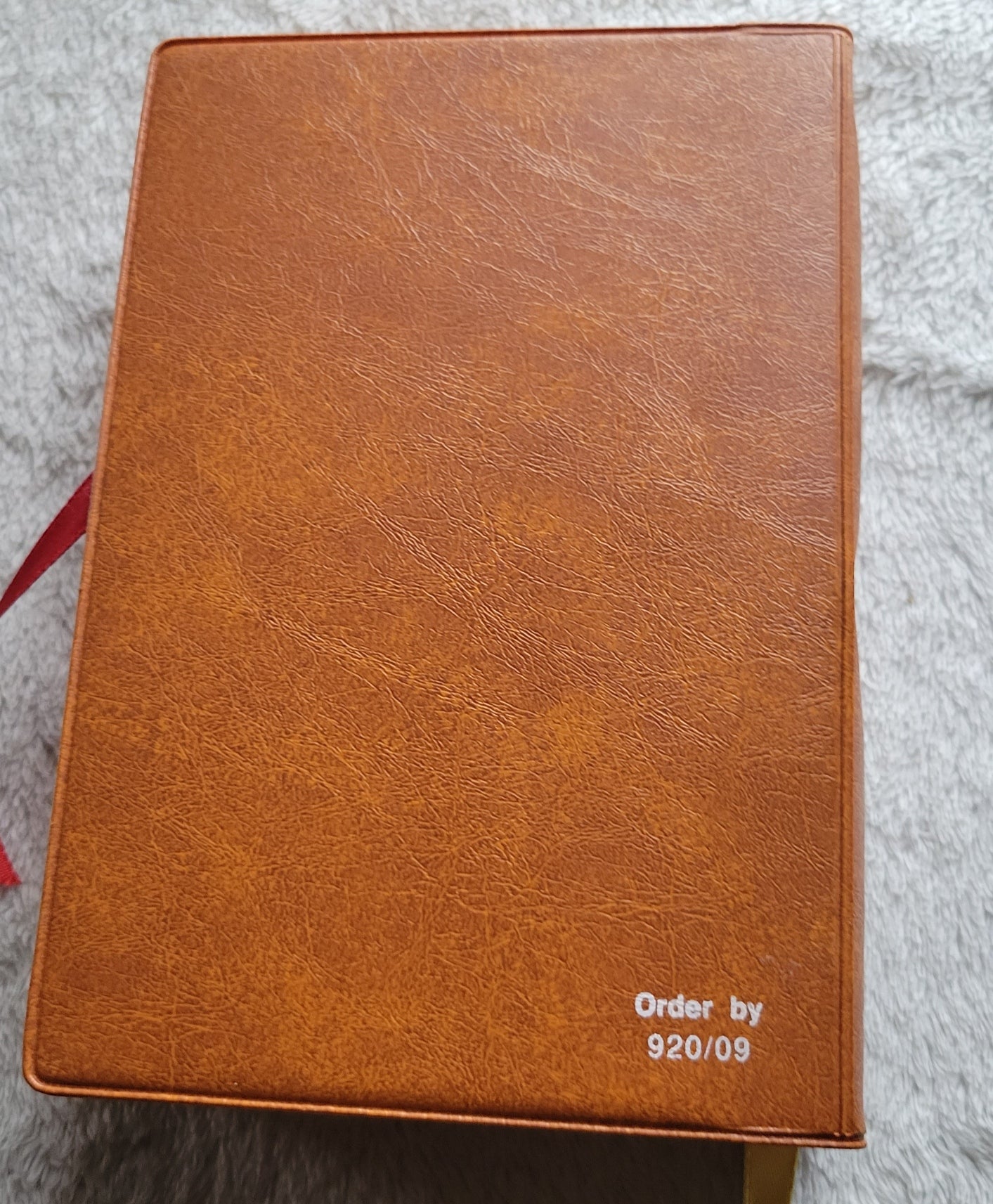 Vintage book for sale, "New....St. Joseph Weekday Missal Vol 1: Advent to Pentecost" Complete Edition, by the Catholic Book Publishing Company, "In accordance with Vatican II". View of back counter.
