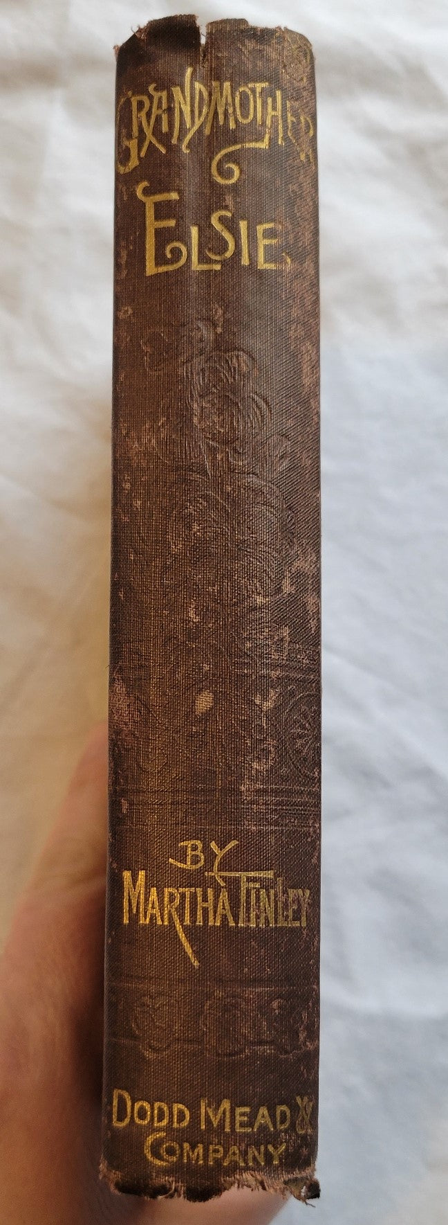 Antique book for sale "Grandmother Elsie" by Martha Finley, published by Dodd, Mead, & Company, copyright 1882.  This is the 8th book in the Elsie Dinsmore series.  View of spine.