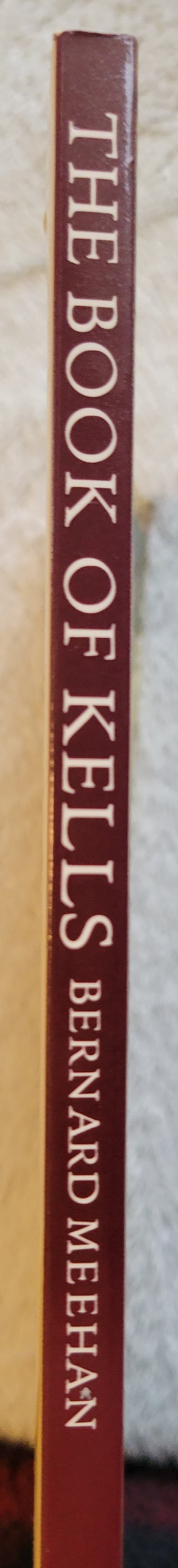  Used book for sale "The Book of Kells: An Illustrated Introduction to the Manuscript in Trinity College Dublin" by Bernard Meehan, published by Thames & Hudson, Ltd, copyright 1994, reprint in 2013. Spine.