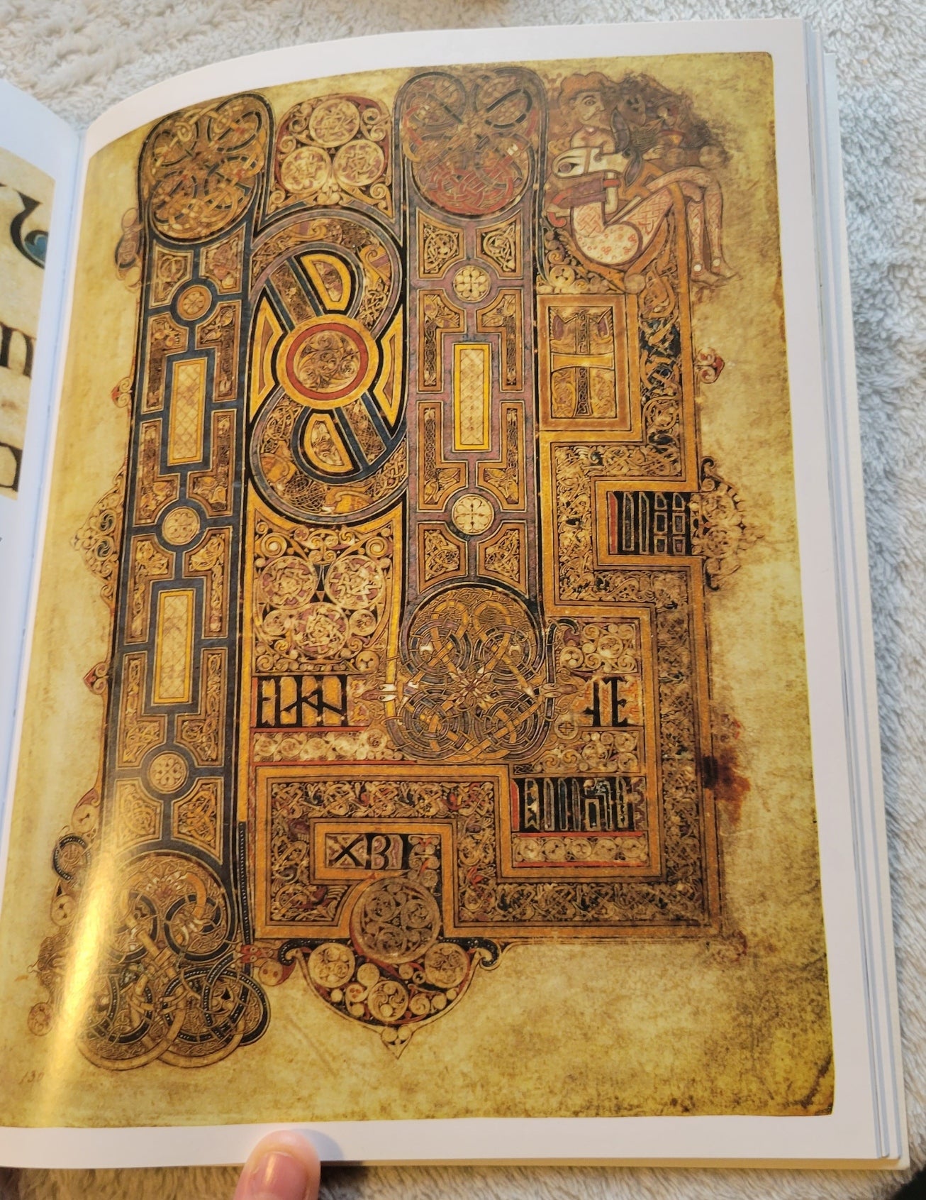  Used book for sale "The Book of Kells: An Illustrated Introduction to the Manuscript in Trinity College Dublin" by Bernard Meehan, published by Thames & Hudson, Ltd, copyright 1994, reprint in 2013. Illustration