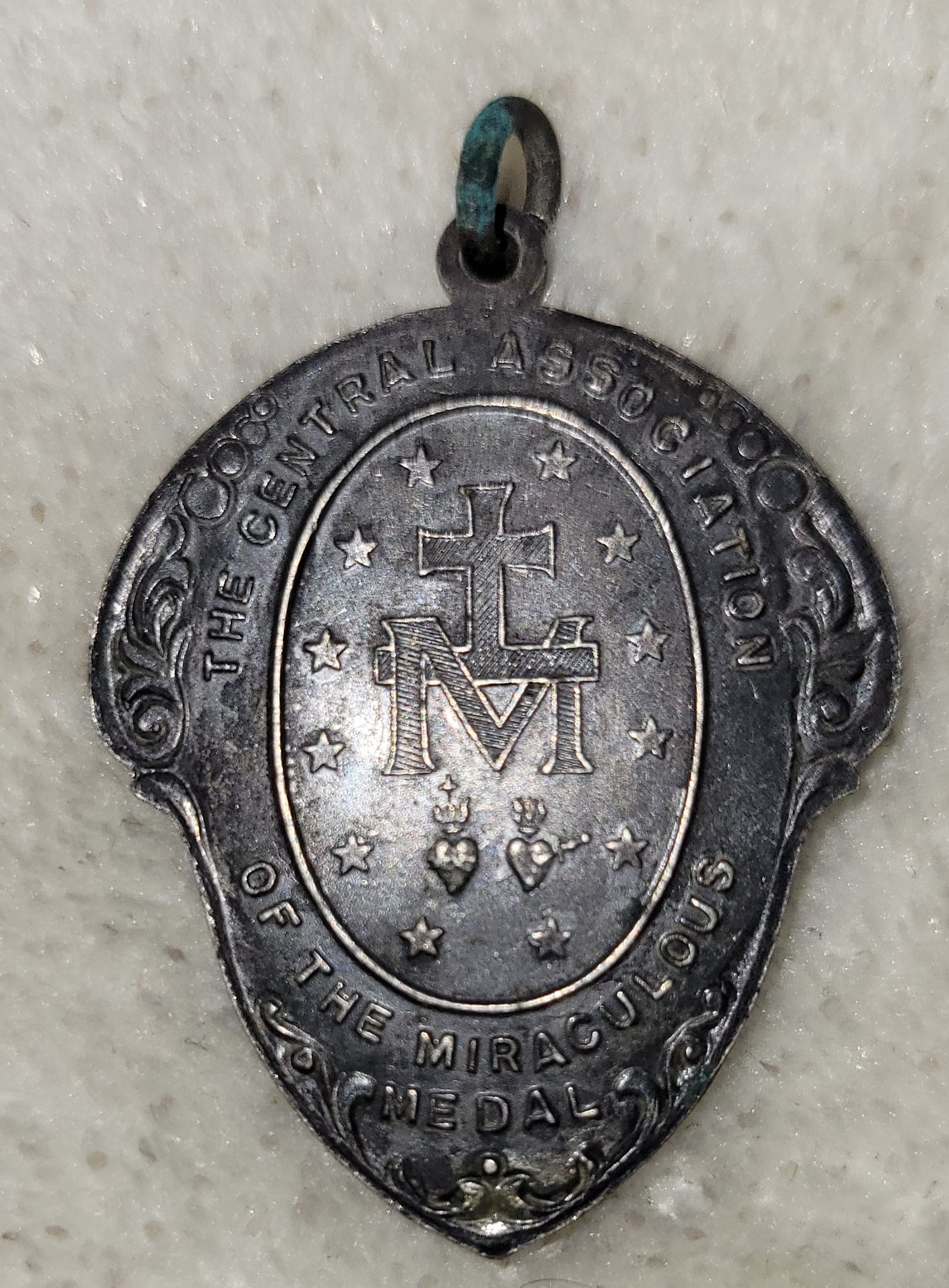 Antique medal The Miraculous Medal Shrine Pendant Germantown PA revealed to St. Catherine Labouré at the Rue de Bac Chapel in 1830 by the Virgin Mary herself. Back view.