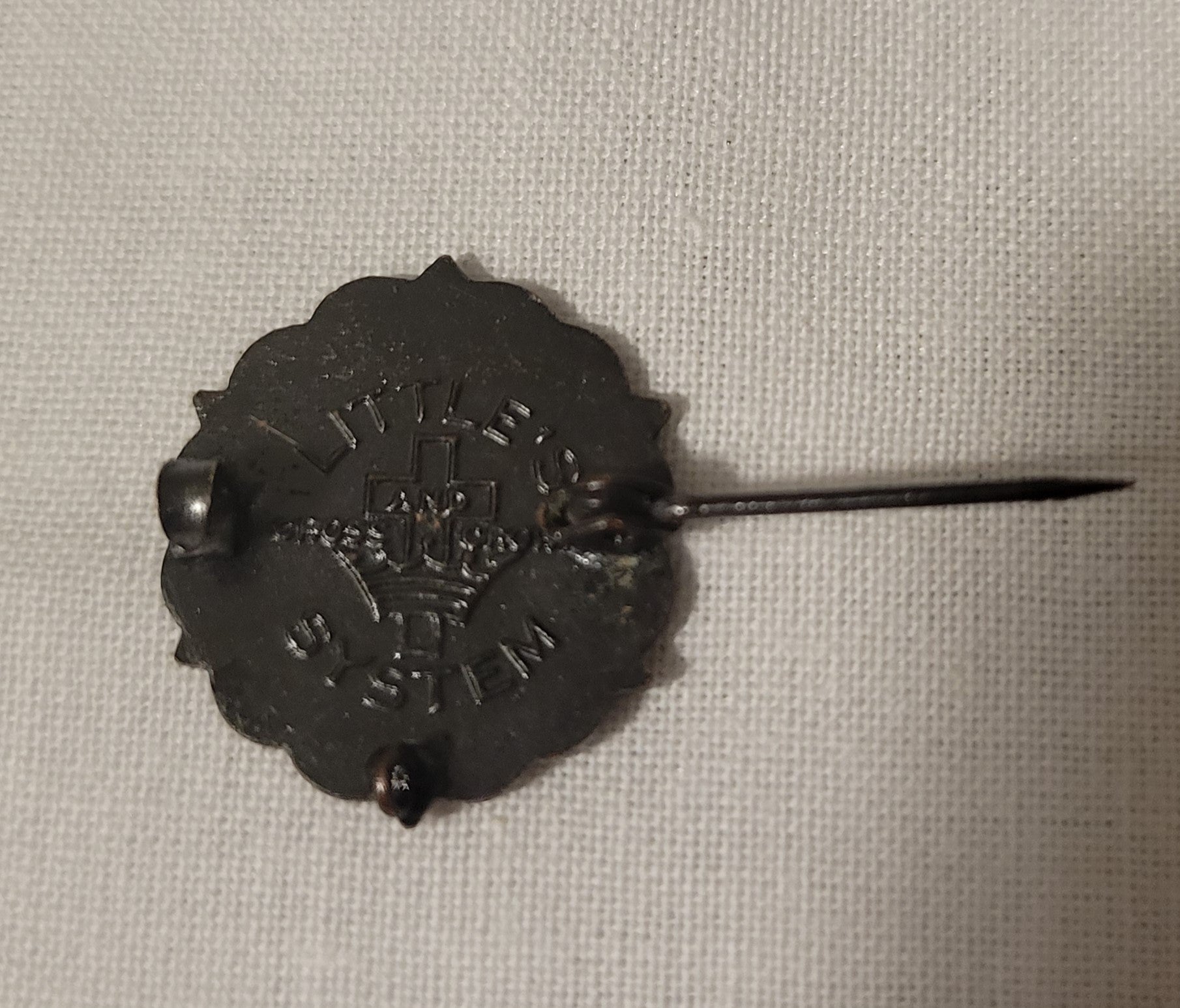 Vintage copper Methodist Sunday school pin. Back view.