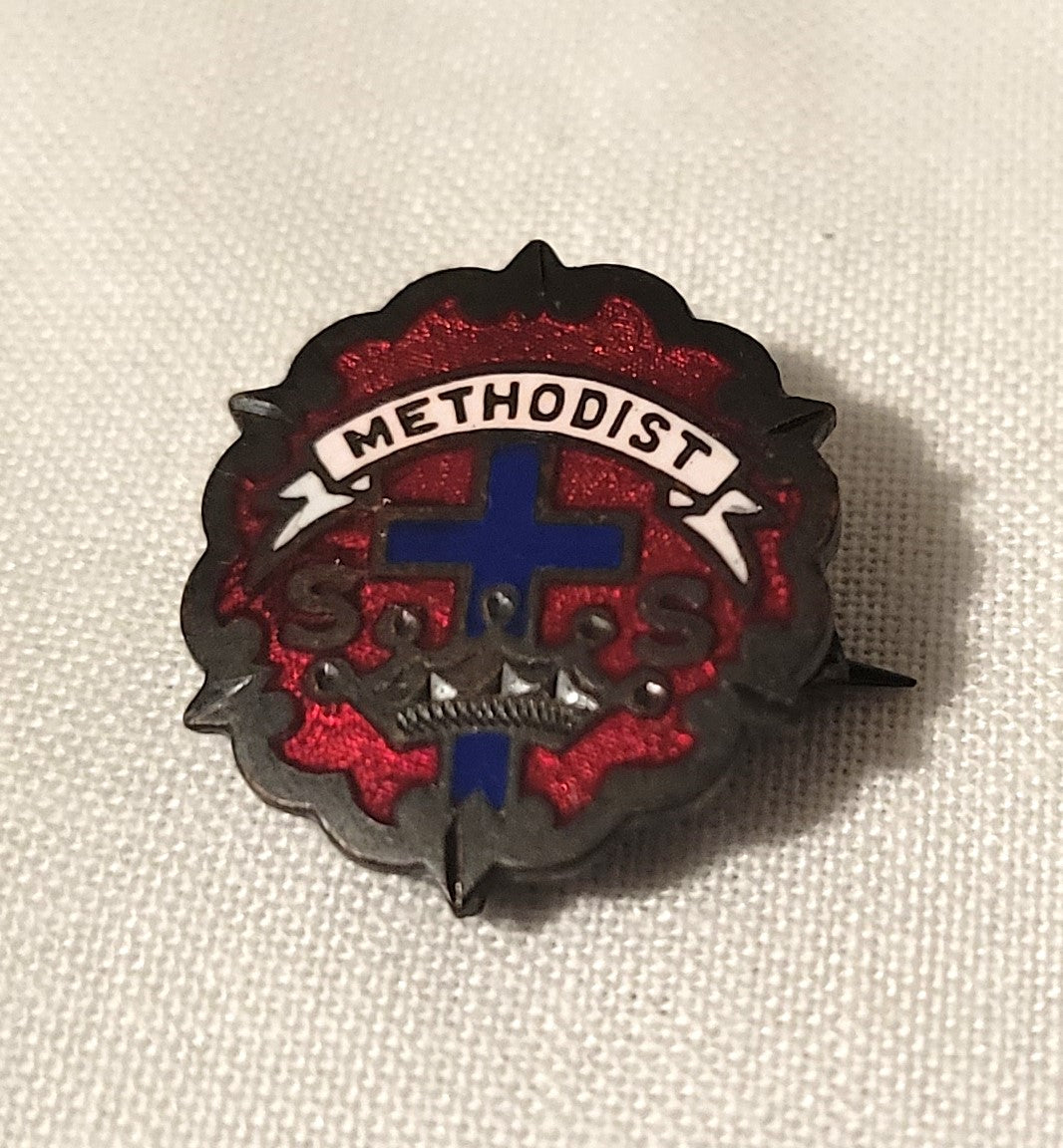 Vintage Methodist Sunday school pin with red and blue inlays. Front view.