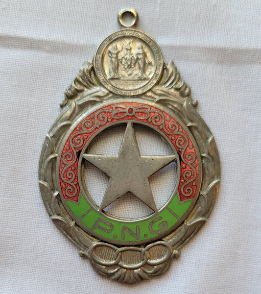 Vintage Past Noble Grand pendant from a Rebekah lodge of the Independent Order of Odd Fellows. Front view.