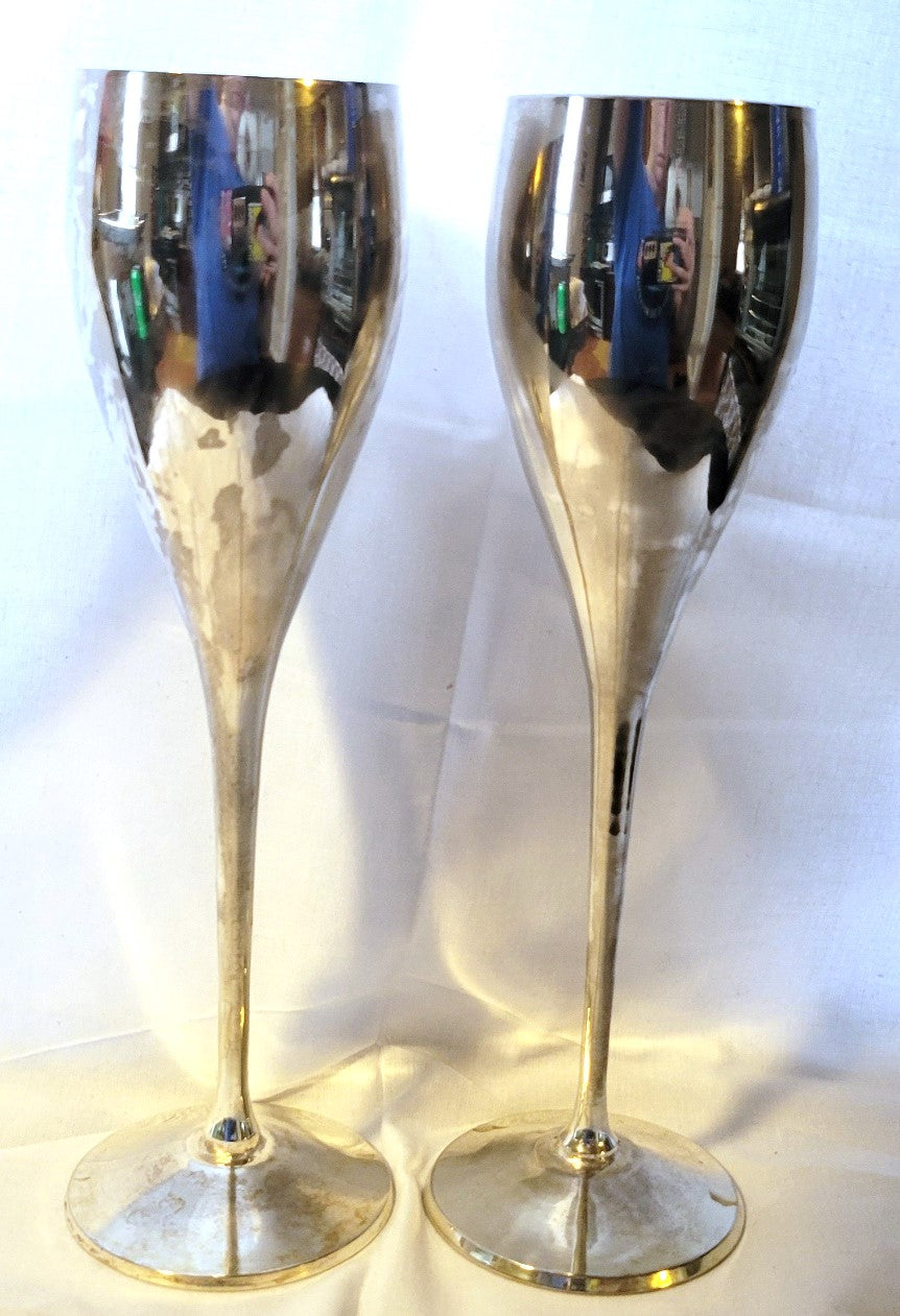 Vintage set of two International Silver Company silverplated glasses, handmade goblets from India, made in the 1980s.  Front view.