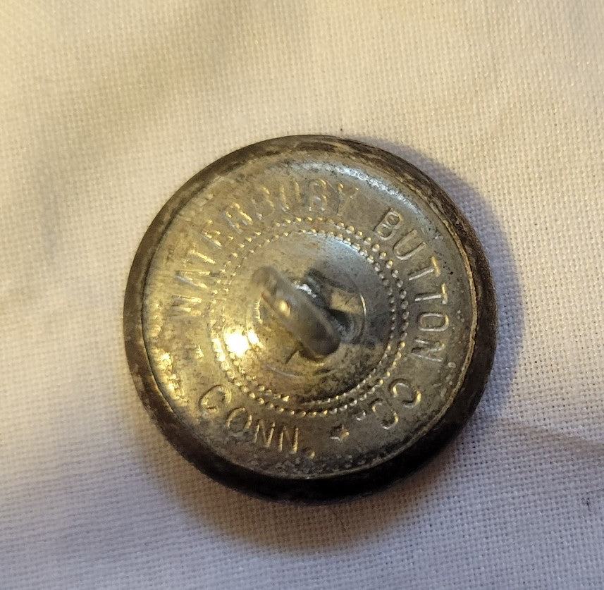 Waterbury Button Company Division U.S. Public Health Service Commissioned Corps insignia button. Back view.