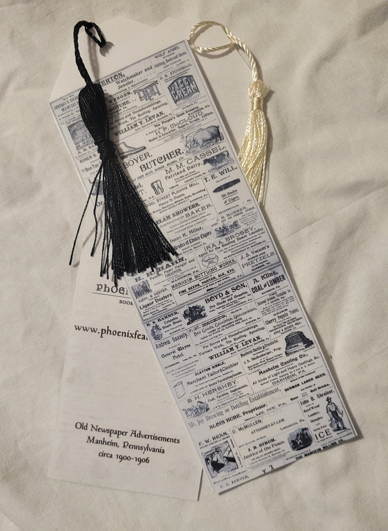 Handmade bookmark by Phoenix Feather Books & Curios with vintage advertisements from Manheim, Pennsylvania.