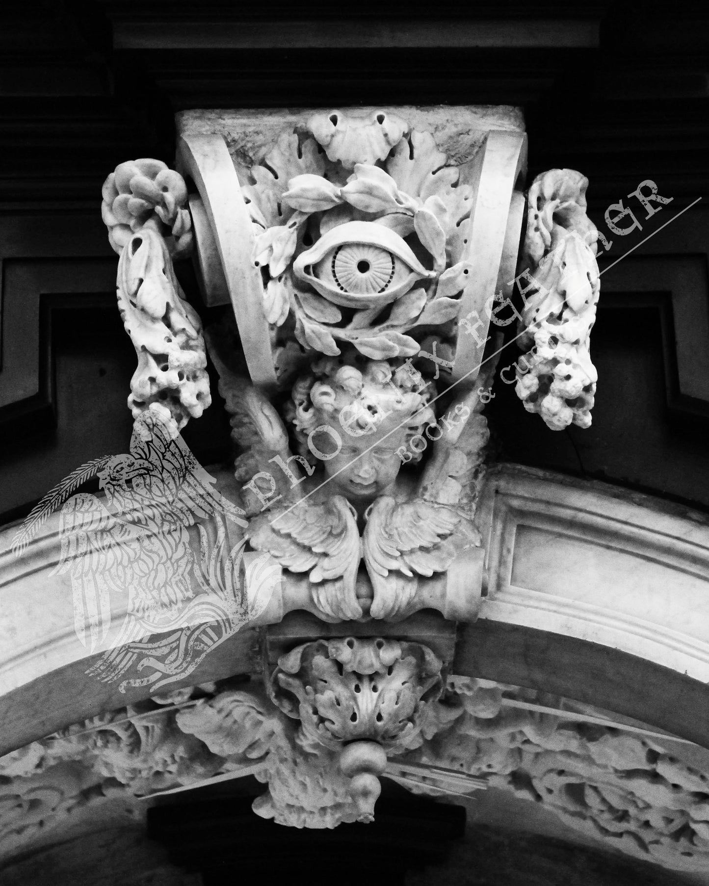 Travel photography for sale.  Gifts for history lovers and travelers. Black and white photograph of a beautiful and somewhat eerie marble corbel is from a church in Brugge, Belgium.